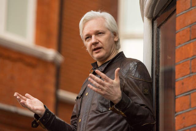 Julian Assange has been freed from Belmarsh Prison and has left the UK, WikiLeaks said (PA)