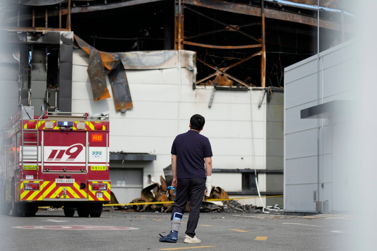 South Korean rescuers search burned factory after a blaze killed 22, mostly Chinese migrants South Korean rescuers search burned factory after a blaze killed 22, mostly Chinese migrants