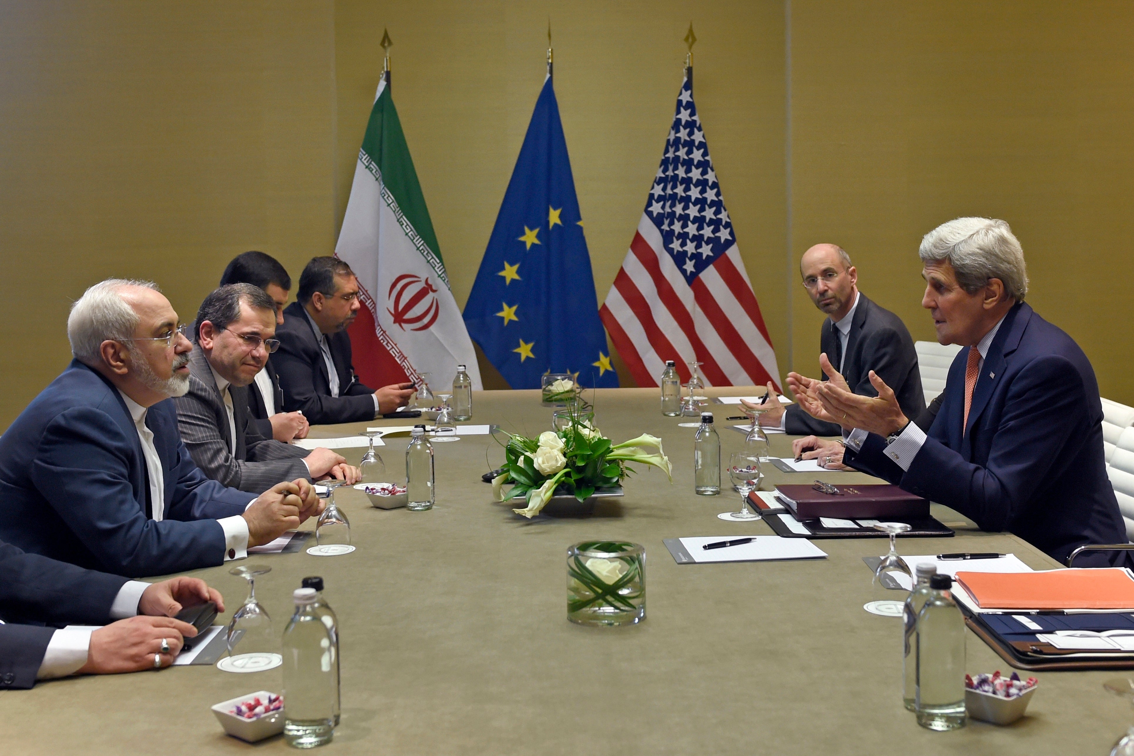 U.S. Secretary of State John Kerry, right, during official talks with Iranian Foreign Minister Mohammad Javad Zarif, left, in Geneva, Switzerland, May 30, 2015.