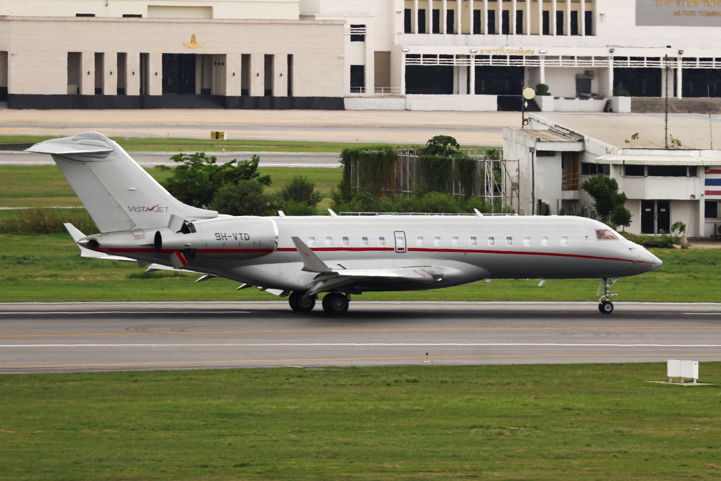 A private jet believed to be carrying Wikileaks founder Julian Assange, after he left a British prison, is pictured on the tarmac at Don Mueang International Airport in Bangkok, Thailand