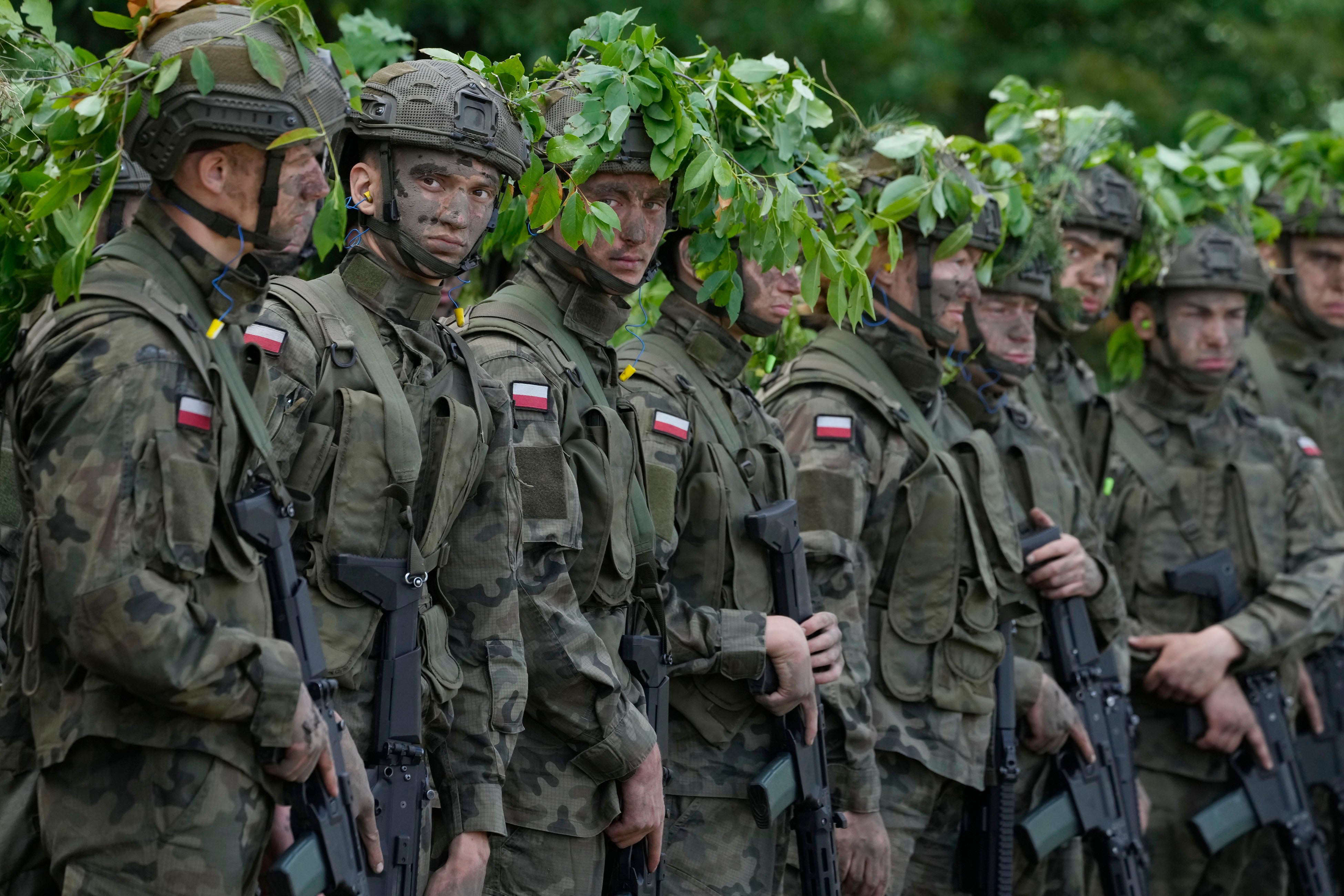 Volunteers takes part in basic training with the Polish army in Nowogrod, Poland, on Thursday June 20, 2024