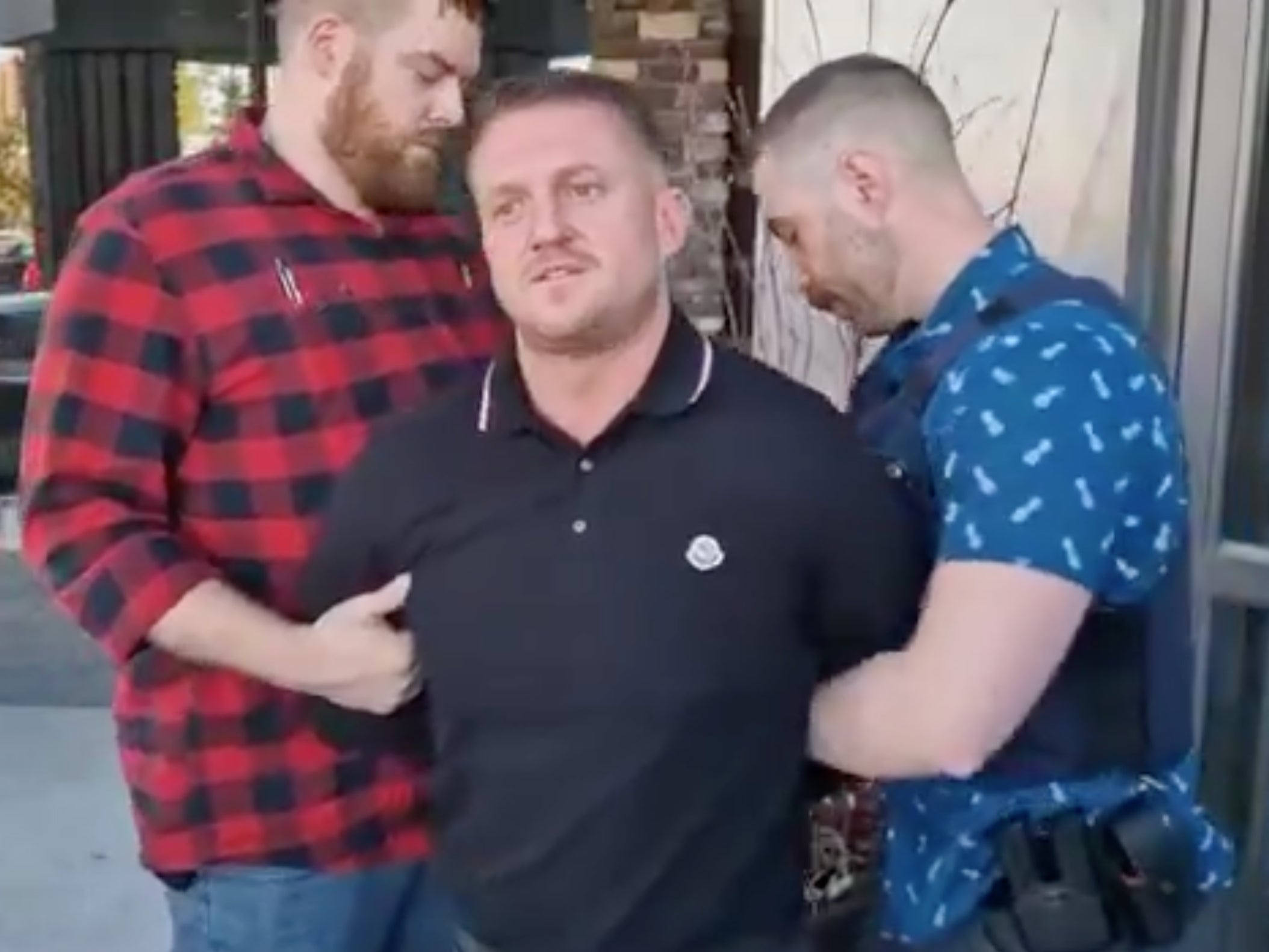 Tommy Robinson, whose real name is Stephen Yaxley Lennon, was filmed being arrested on Monday
