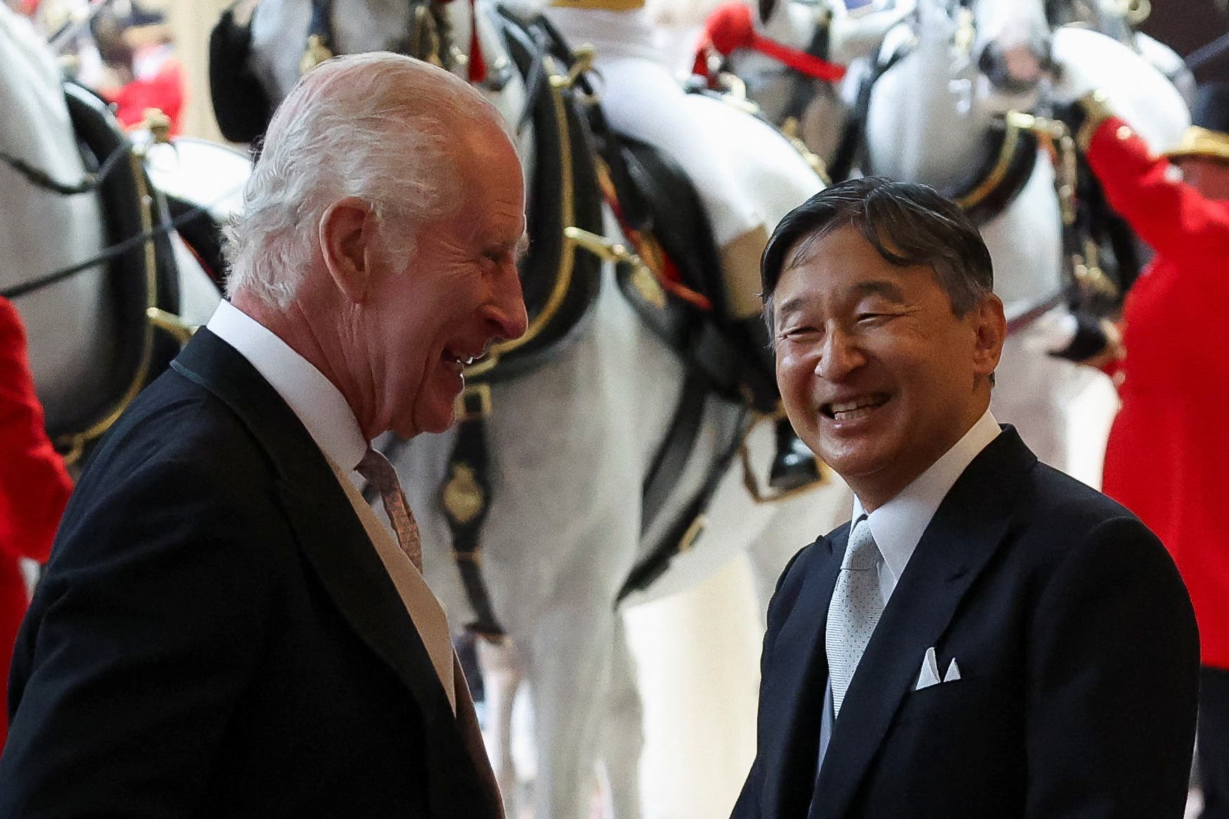 The King, left, and Emperor Naruhito arriving at Buckingham Palace (Suzanne Plunkett/PA)
