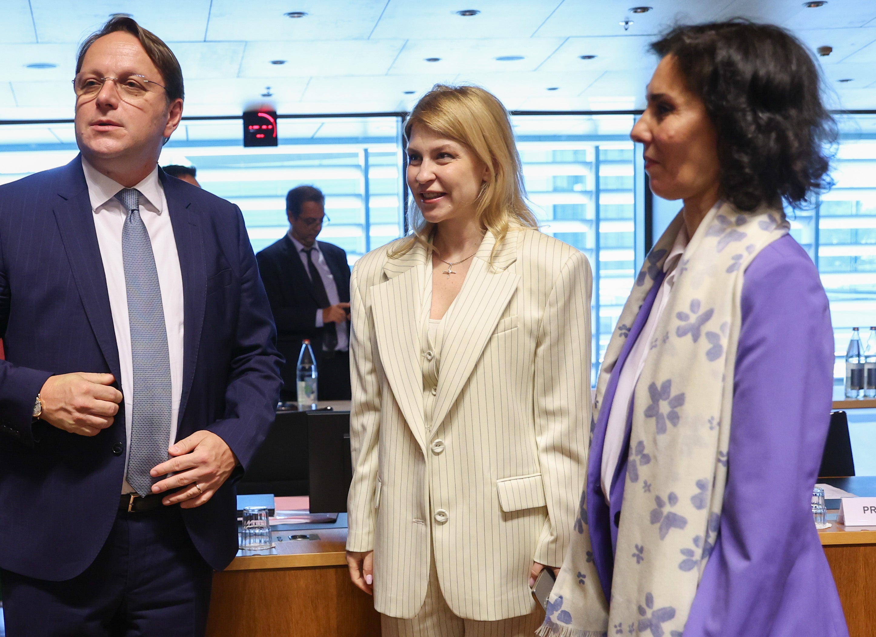 European Union enlargment chief Oliver Varhelyi (L) is pictured with Ukrainian deputy prime minister Olha Stefanishyna (C) and Belgian foreign minister Hadja Lahbib (R) in Luxembourg last year