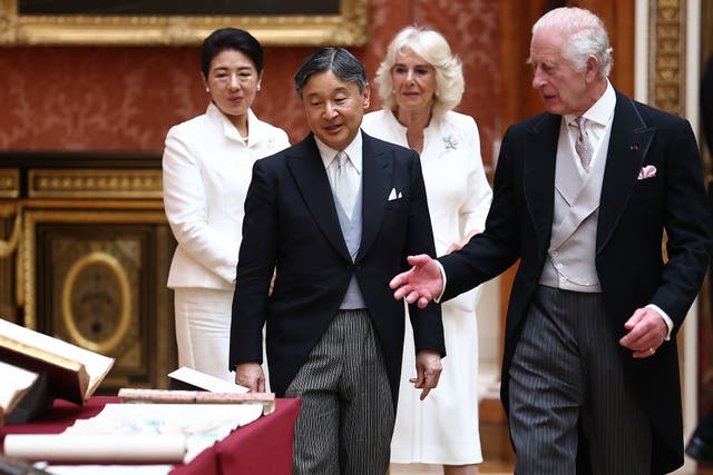 <p>King Charles and Queen Camilla show Japan’s Emperor Naruhito and Empress Masako around Buckingham Palace (Henry Nicholls/PA)</p>