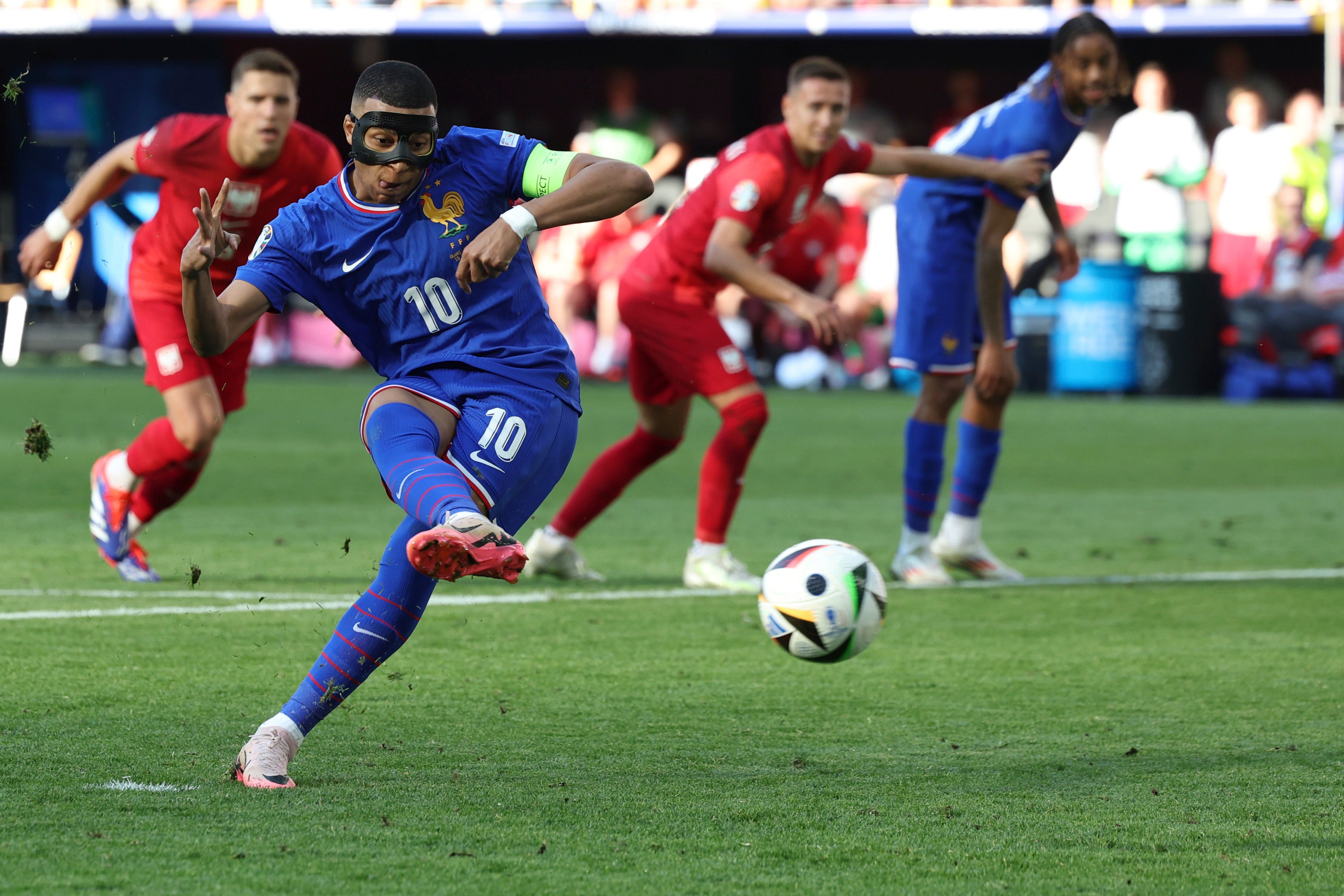 Kylian Mbappe converts from the penalty spot.