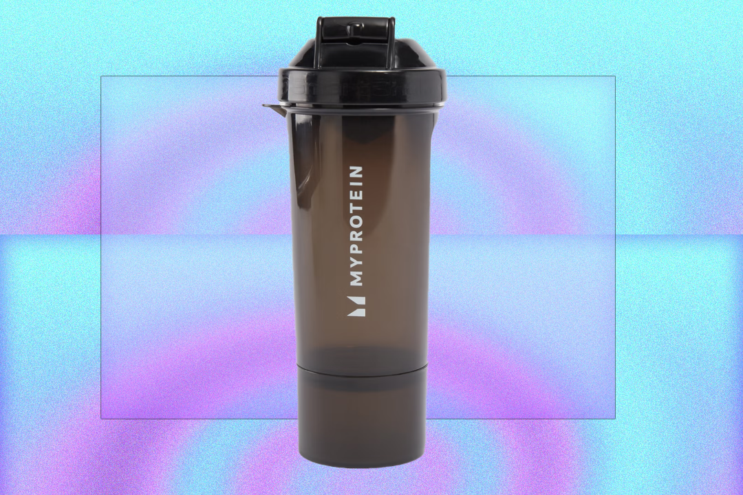 The bottle features a screw-on storage container