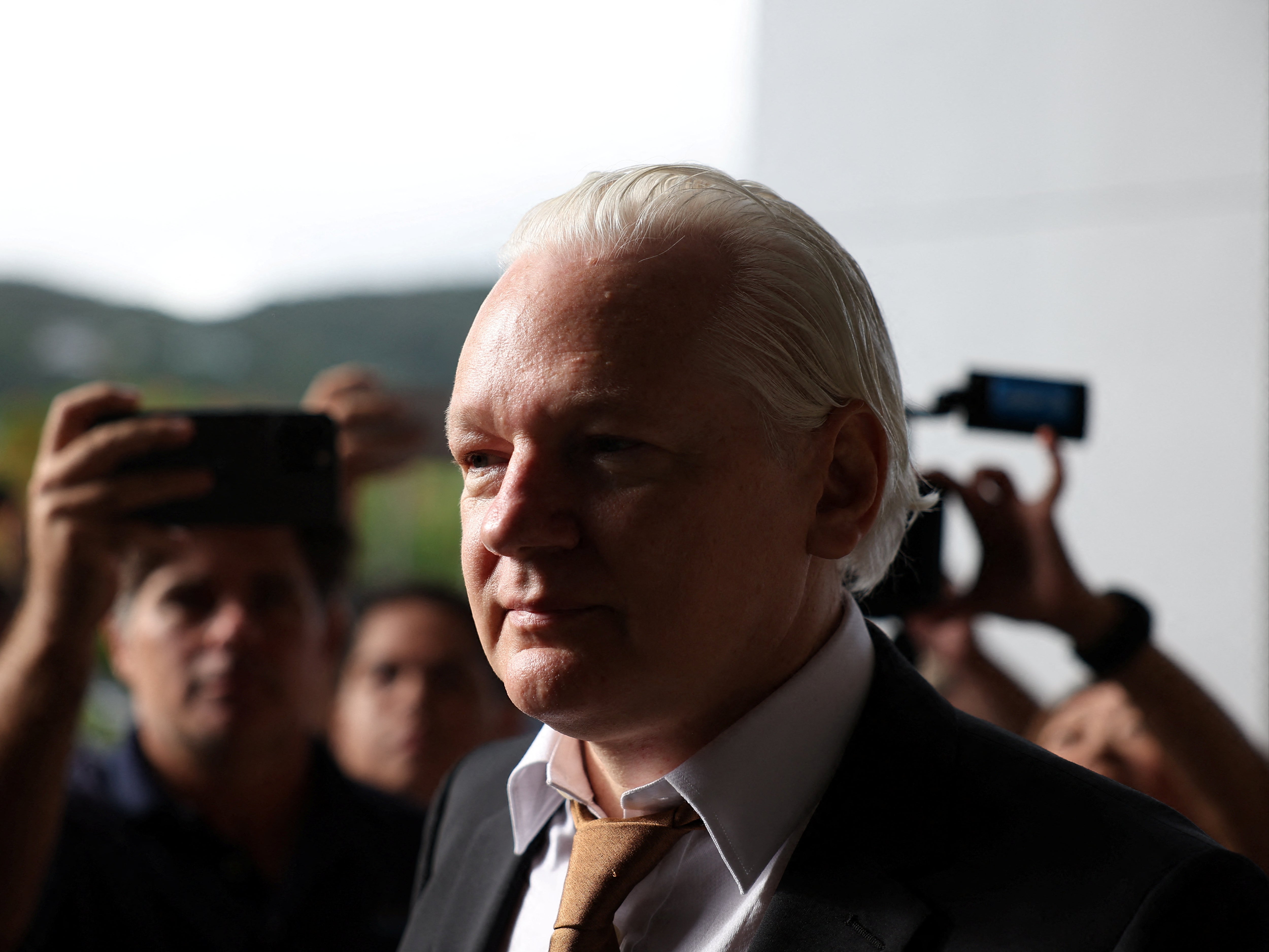 Julian Assange arrives at the US district court in Saipan on June 26, 2024