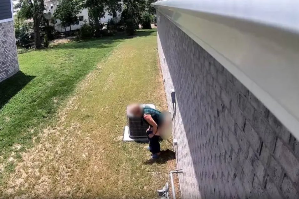 A 74-year-old board member of a local Homeowners Association in Indiana was caught on surveillance footage defecating against the wall of her neighbor