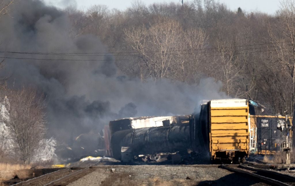 Smoke rises from a derailed cargo train in East Palestine, Ohio, on February 4, 2023. A decision to release and burn toxic chemicals from five derailed train cars in East Palestine last year was not necessary, federal officials said on Tuesday