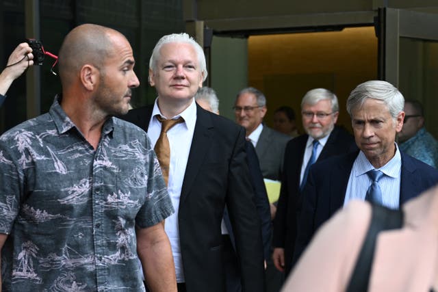 <p>WikiLeaks founder Julian Assange leaves the US Federal Courthouse in the Commonwealth of Northern Mariana Islands in Saipan, Northern Mariana Islands, on 26 June 2024</p>