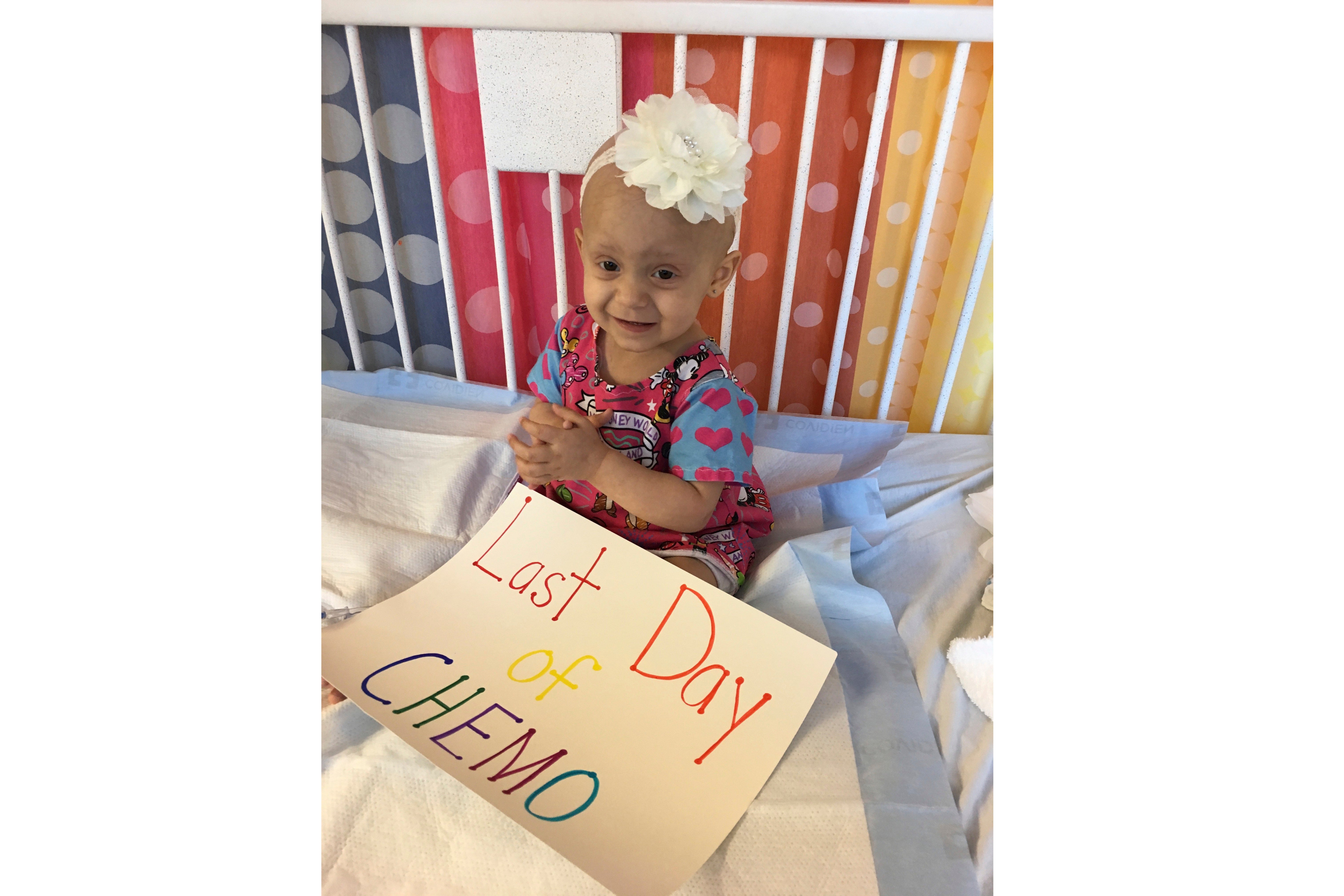 Giada Demma, 1-year-old, sits in a pediatric hospital bed at NYU Langone Medical Center in New York on Oct. 17, 2017, the last day she was scheduled to undergo chemotherapy for cancer. Her family had a seamstress make the Disney hospital gown Giada is wearing. But seeing the child wearing a drab hospital issued-gown on a different date helped inspired Giada’s cousin Guiliana Demma to learn to sew and make brightly colored, kid-themed hospital gowns for hospitalized children