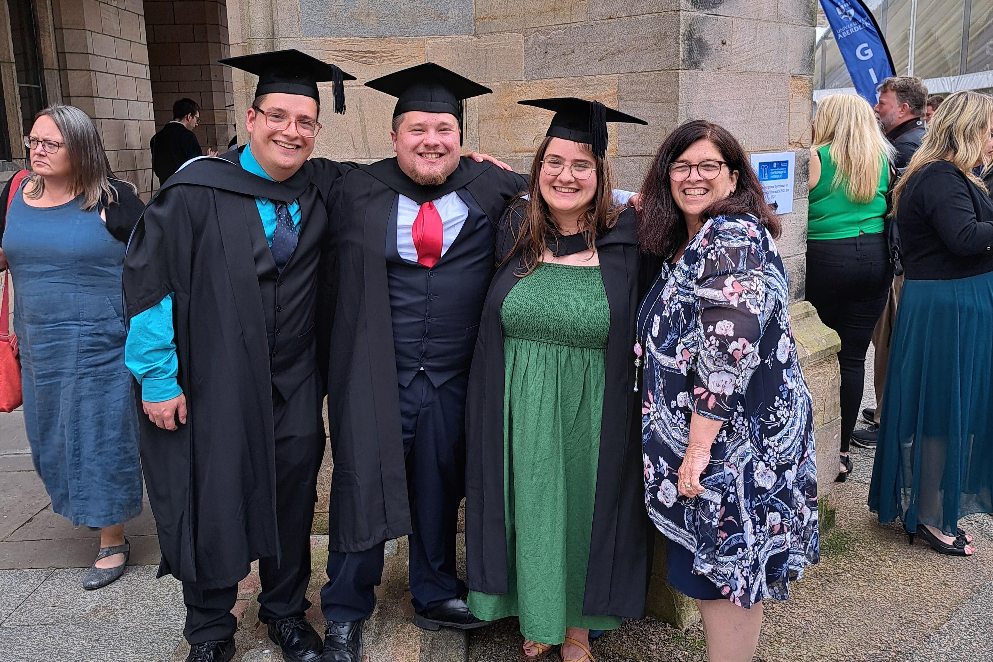 John (left), Josh (centre) and Anna (centre-right) Pizzuto-Pomaco with their mother Julia (right) (Josh Pizzuto-Pomaco/PA)