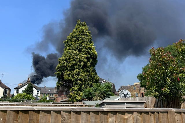 The fire broke out at a tower block in Staines-upon-Thames on Wednesday (Travelwithdan/PA)