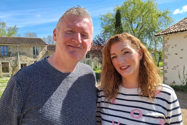 <p>David and Liz Murphy. A family who brought an entire French village say their lives have improved since leaving the UK </p>