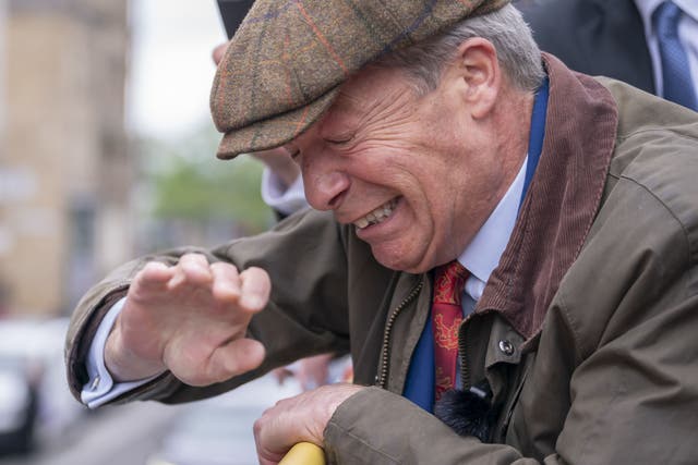 A 28-year-old man has admitted throwing a coffee cup and another item at Reform UK leader Nigel Farage as he campaigned in Barnsley, South Yorkshire (Danny Lawson/PA)