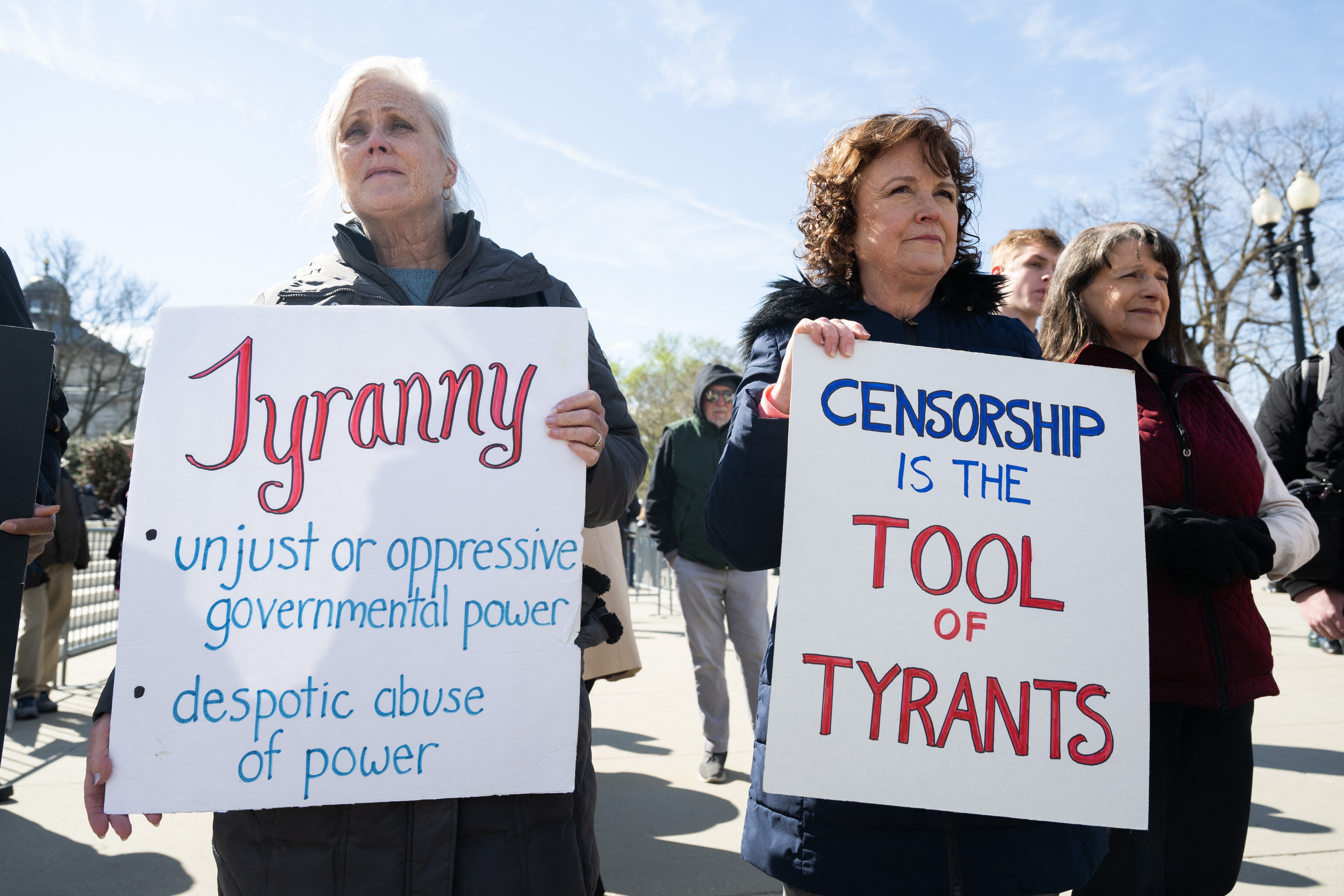 Conservative demonstrators who allege that the government pressured or colluded with social media platforms to censor right-leaning content under the guise of fighting misinformation protest outside the US Supreme Court in Washington, DC, March 18, 2024
