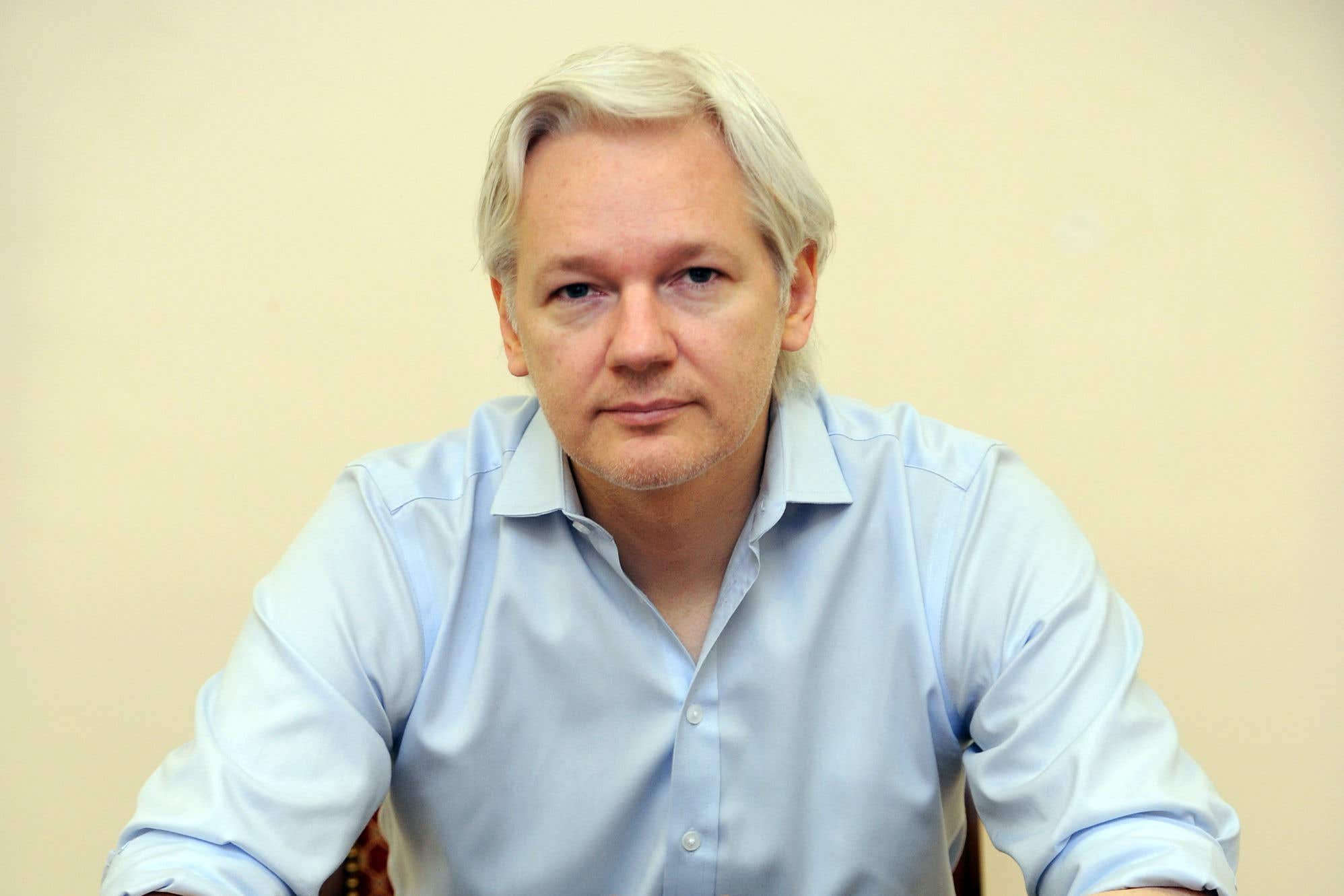 Julian Assange speaking to the media inside the Ecuadorian embassy in London in 2013 (Anthony Devlin/PA)