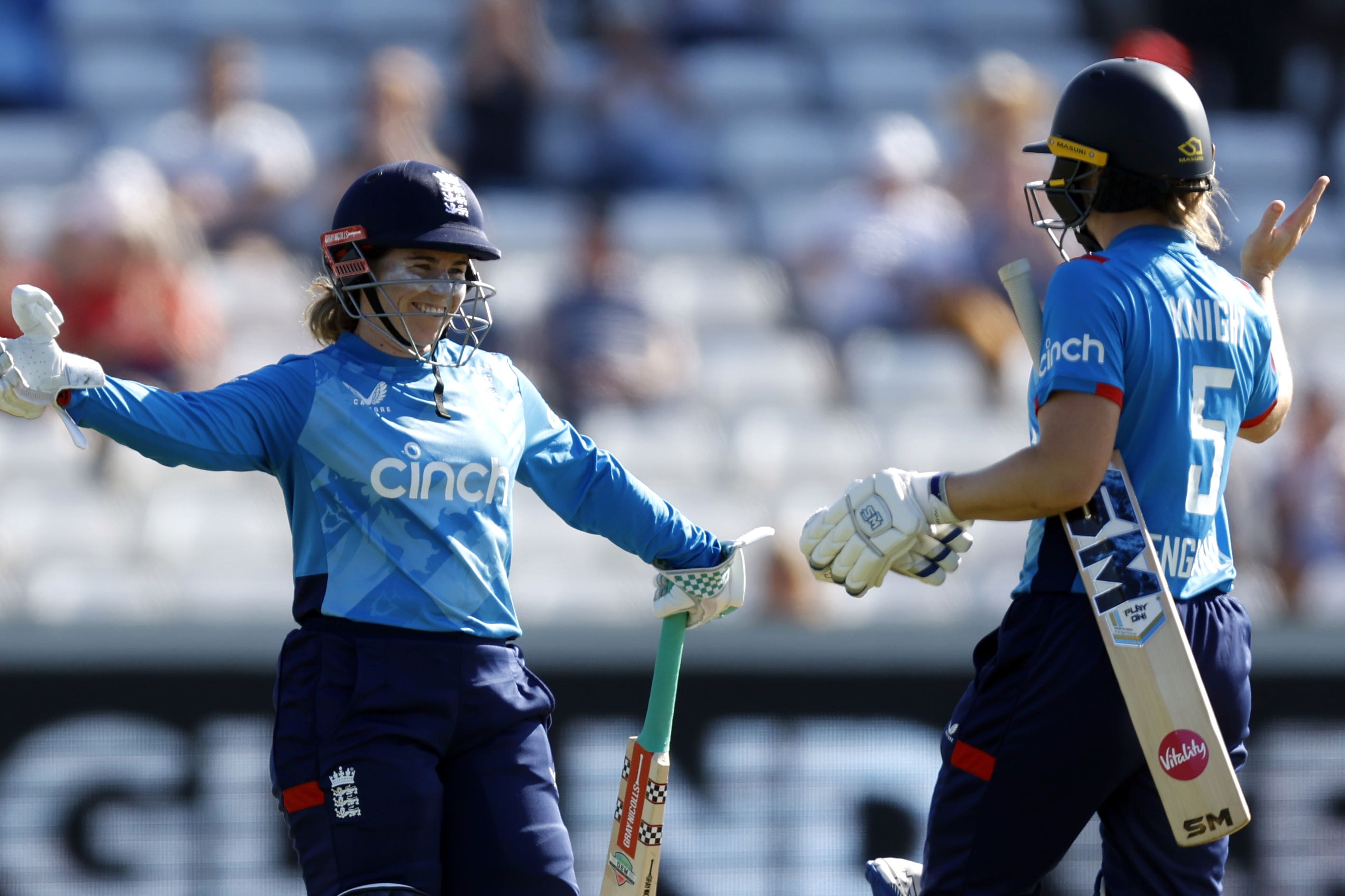 Tammy Beaumont, left, and captain Heather Knight celebrate England’s nine-wicket ODI win over New Zealand in Chester-le-Street (Nigel French/PA)