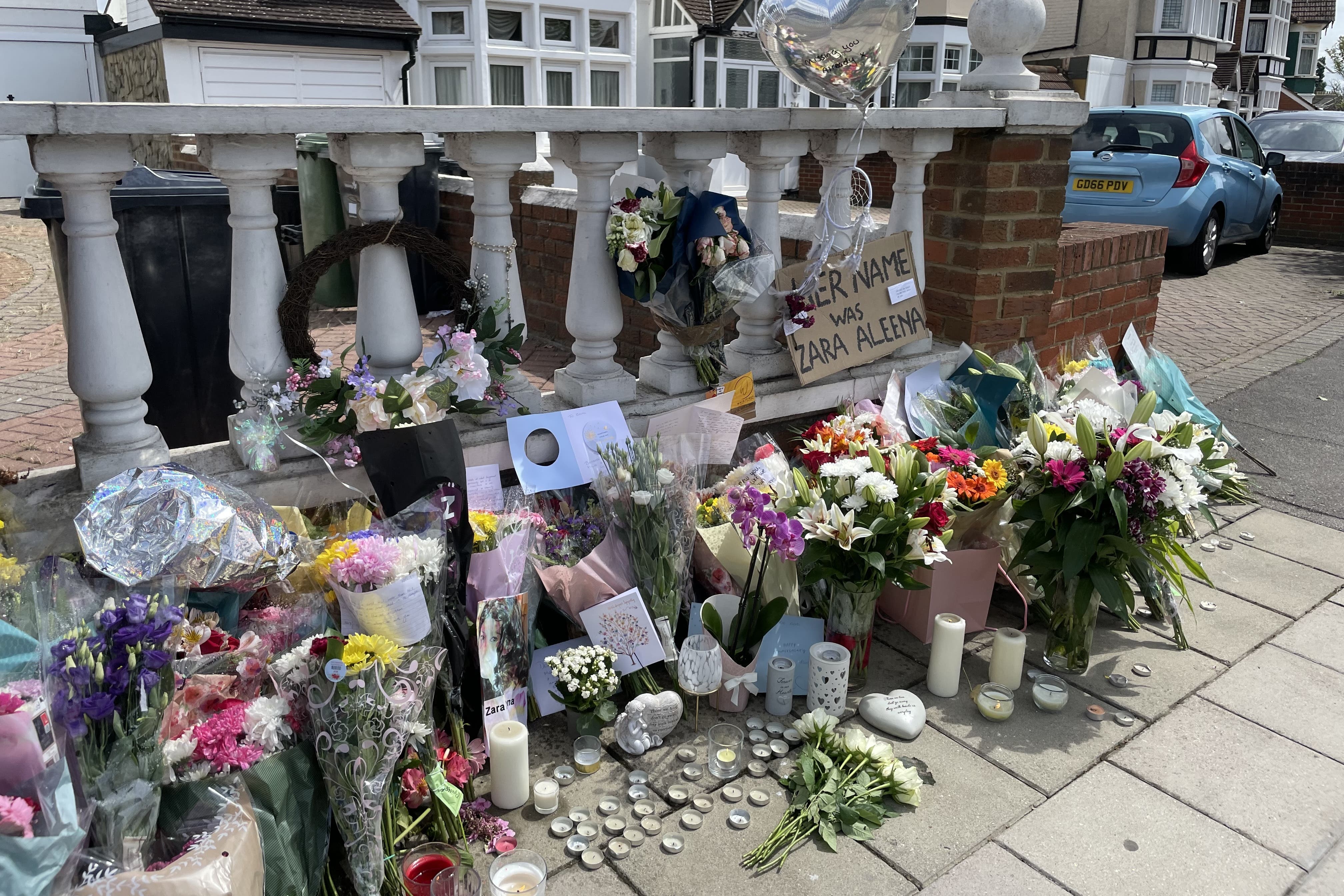 Floral tributes left at the scene on Cranbrook Road in Ilford, east London, where Zara Aleena, 35, was murdered (Ted Hennessey/PA)