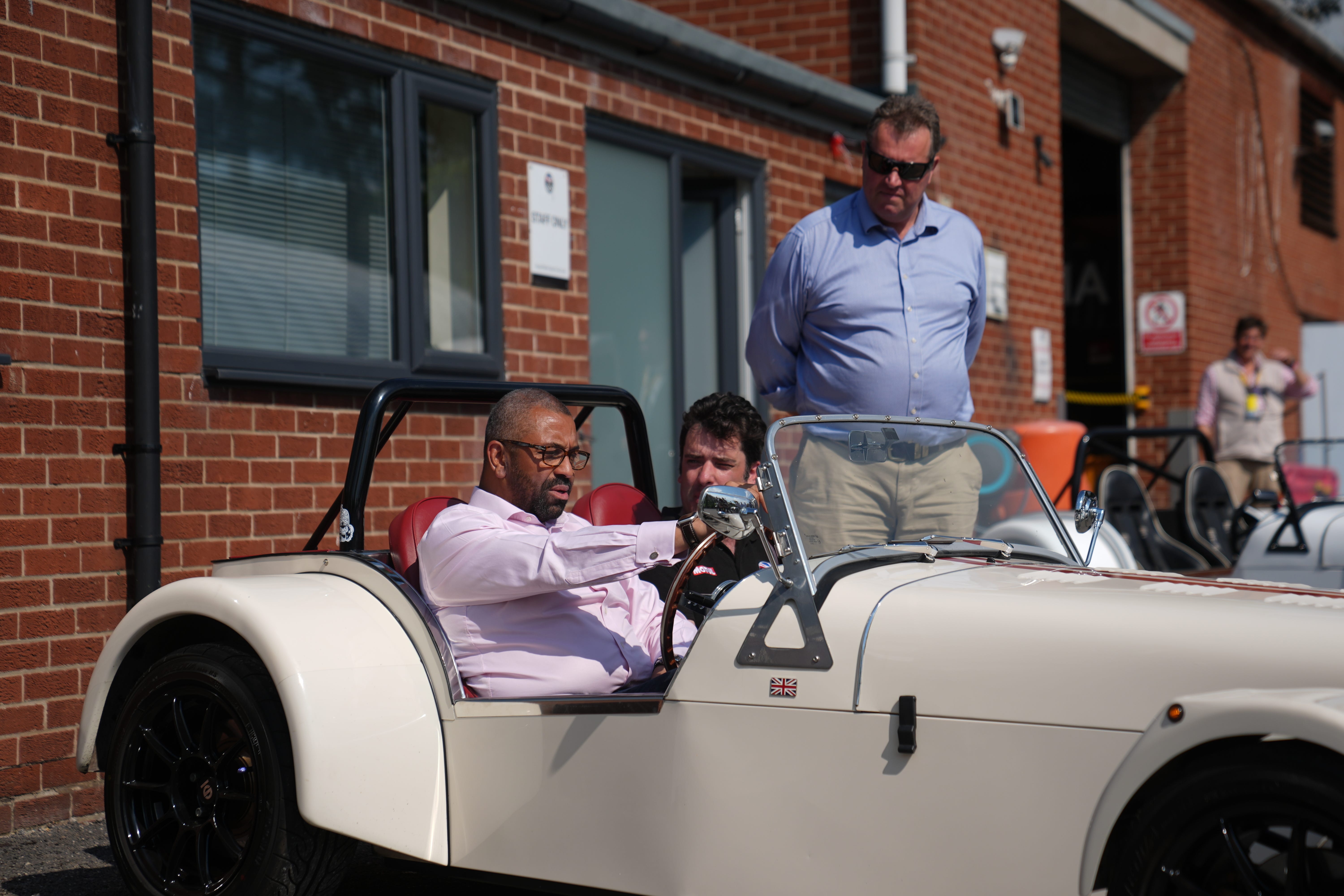 Home Secretary James Cleverly during a visit to Great British Sports Cars in Ollerton, Nottinghamshire (/PA)