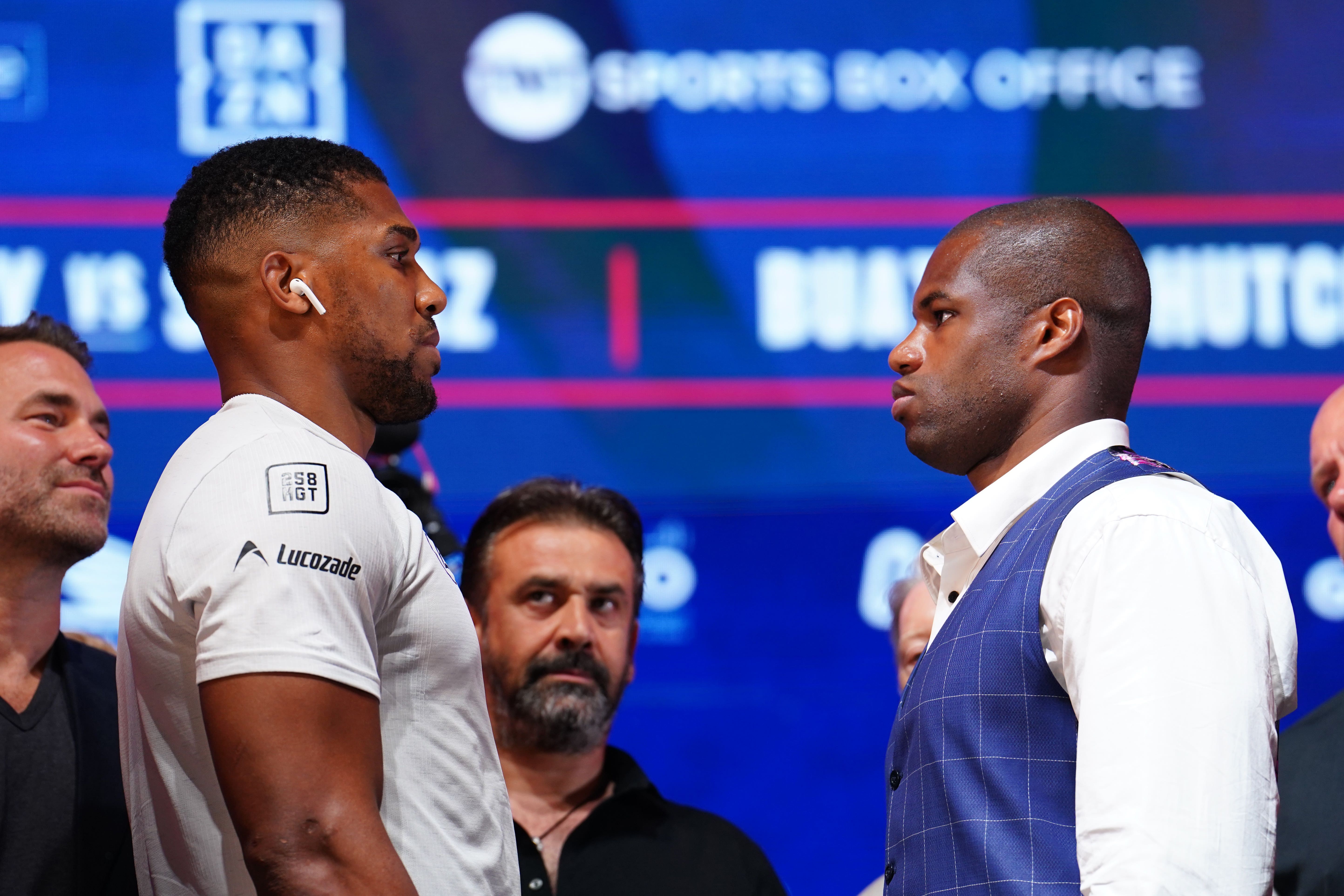 Anthony Joshua (left) and Daniel Dubois face each other at a press conference in June (Jordan Pettitt/PA)