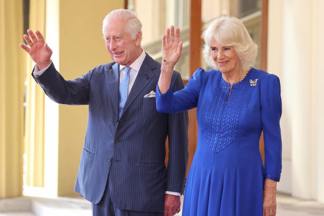 King Charles III and Queen Camilla wave and smiles as they formally bid farewell to Emperor Naruhito and his wife Empress Masako of Japan as they leave Buckingham Palace, on the final day of their state visit to the UK (Chris Jackson/PA)