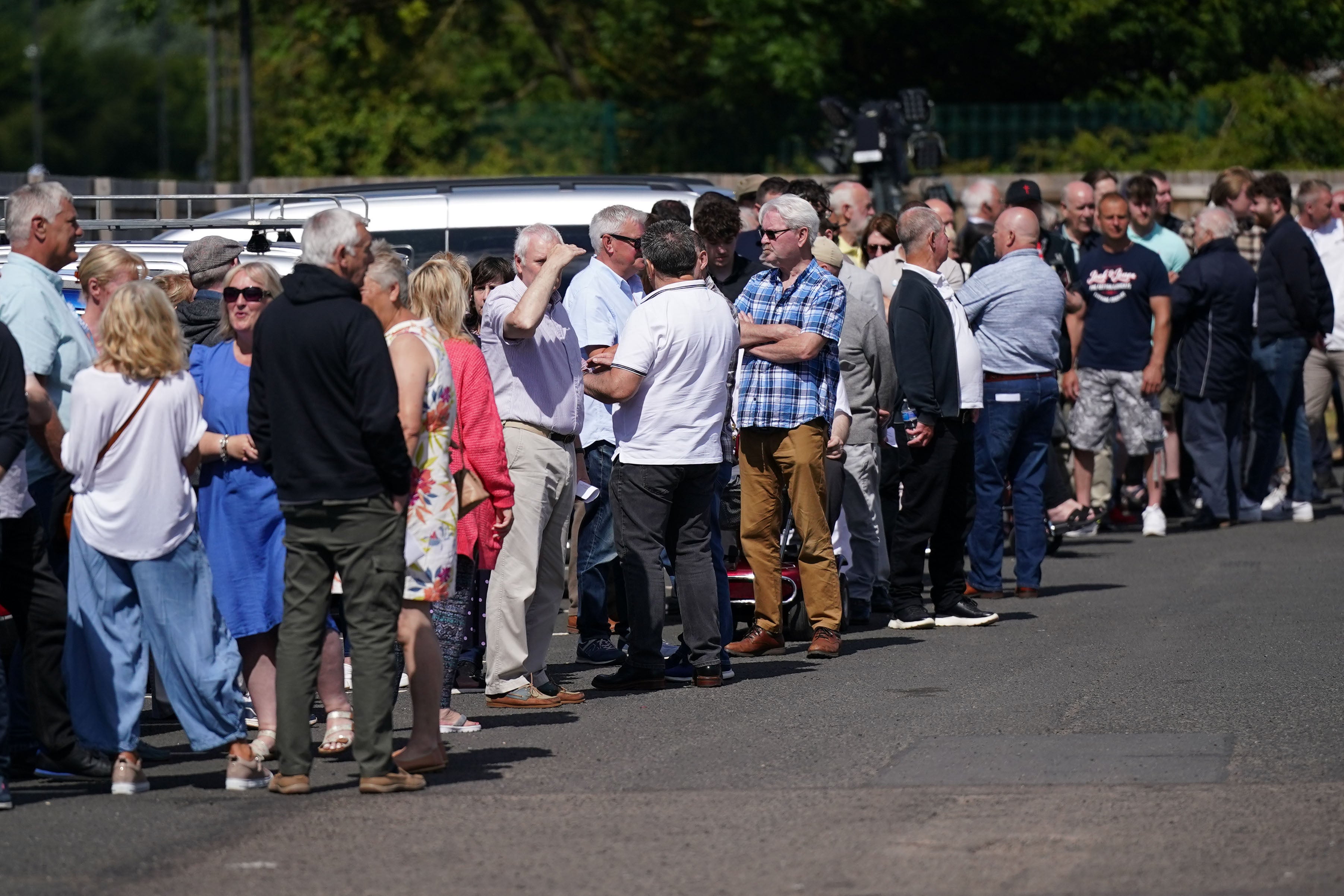 People queue ahead of a campaign event by Reform UK leader Nigel Farage at Rainton Arena in Houghton-le-Spring