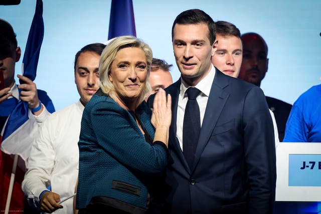 <p>Marine Le Pen and Jordan Bardella of the French far-right National Rally during a political meeting in Paris</p>