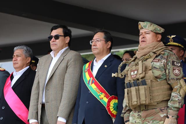 <p>In this handout picture released by Bolivian Presidency, Bolivian President Luis Arce (2nd R) attend a Military event next to Gen. Juan Jose Zuniga (R) in La Paz on April 18, 2024</p>