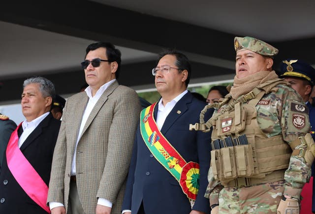 <p>In this handout picture released by Bolivian Presidency, Bolivian President Luis Arce (2nd R) attend a Military event next to Gen. Juan Jose Zuniga (R) in La Paz on April 18, 2024</p>