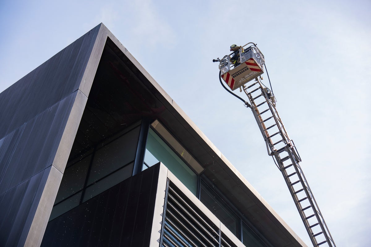 Smoke rises above Copenhagen as Denmark’s taxation ministry evacuated after fire