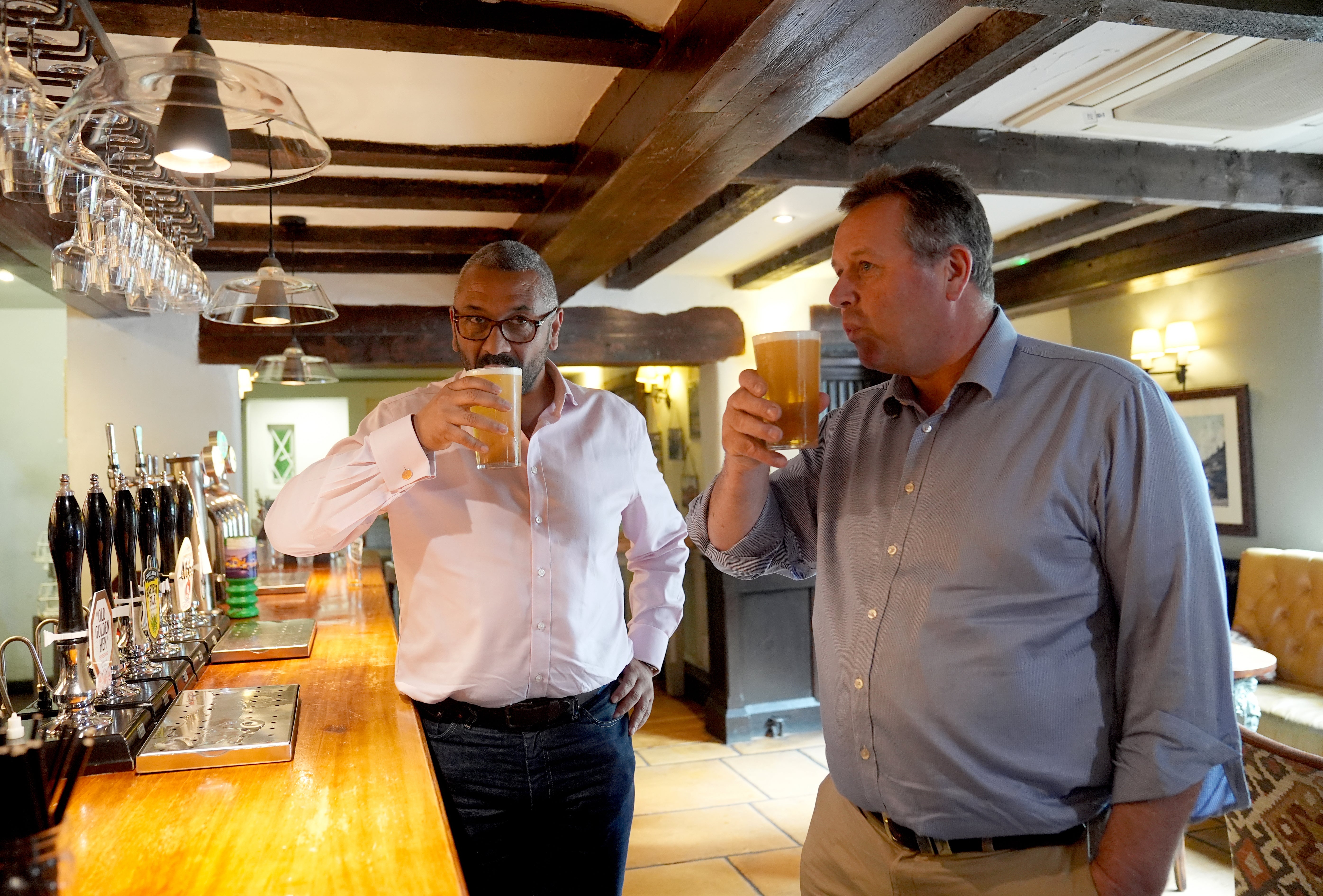 Home Secretary James Cleverly and Mark Spencer during a visit to The Hutt in Nottingham (Joe Giddens/PA)