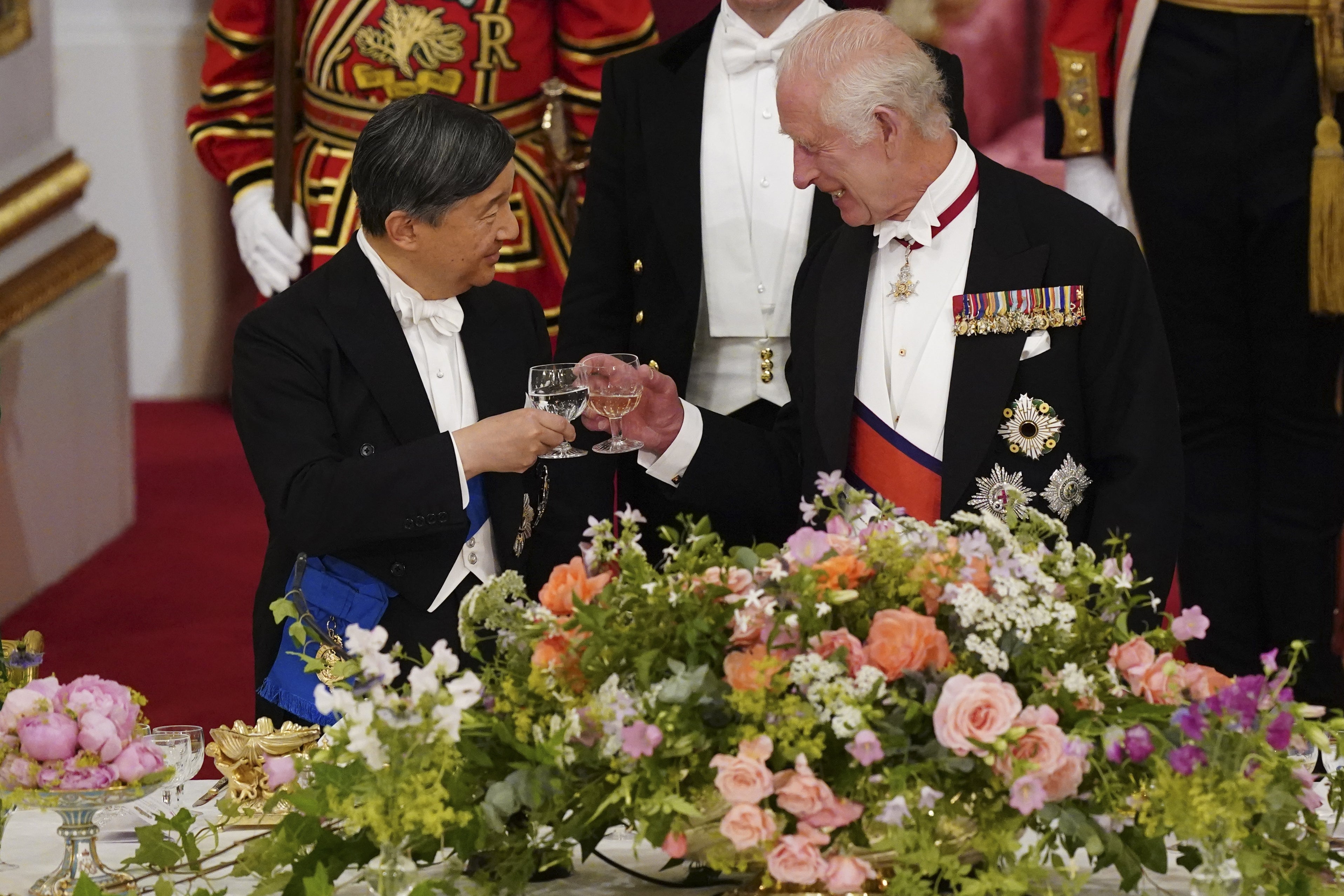 The King and Emperor Naruhito of Japan share a toast during the state banquet (Jordan Pettitt/PA)