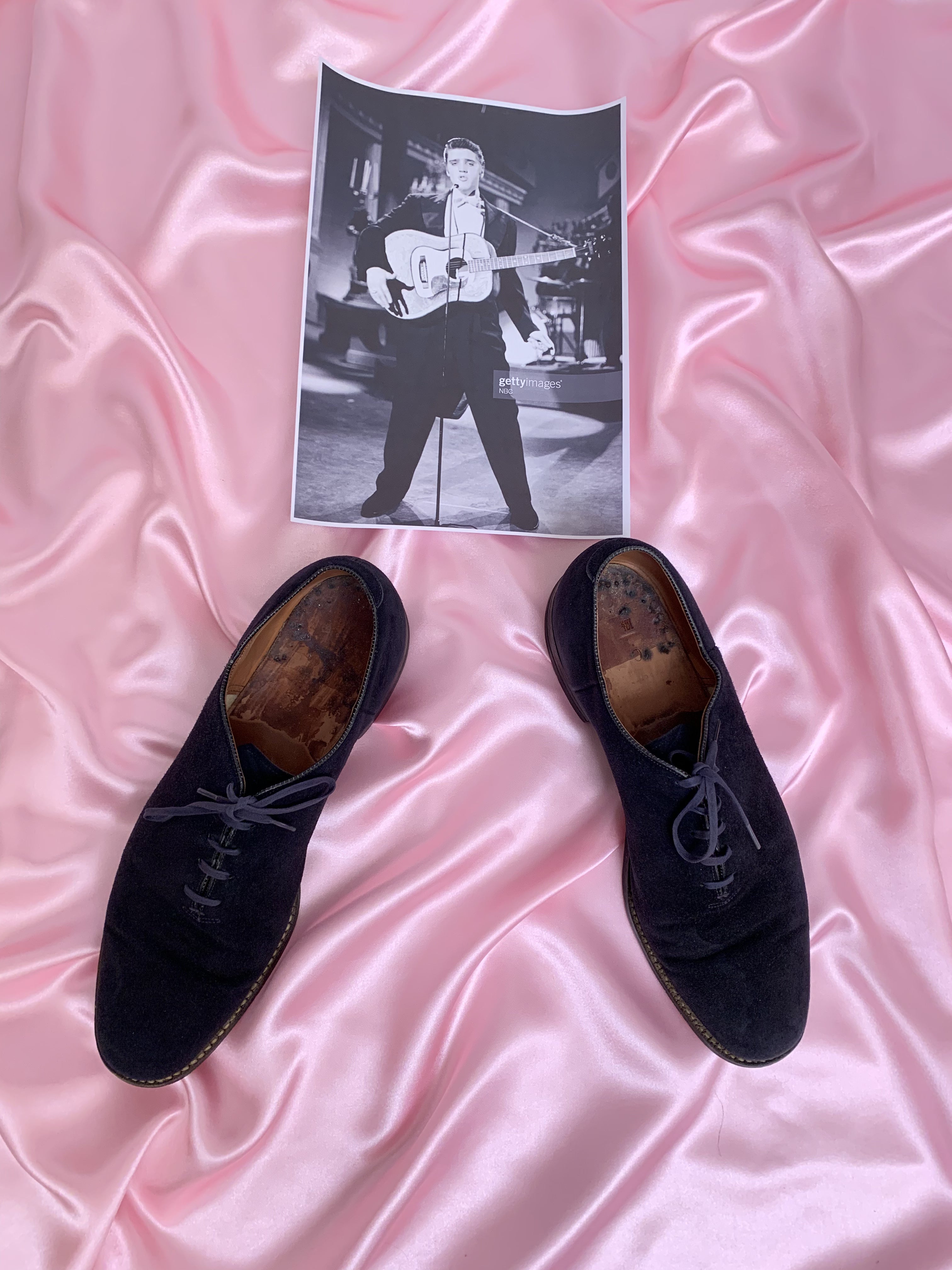 Elvis Presley’s blue suede shoes, pictured, sold for more than $150,000 on Friday