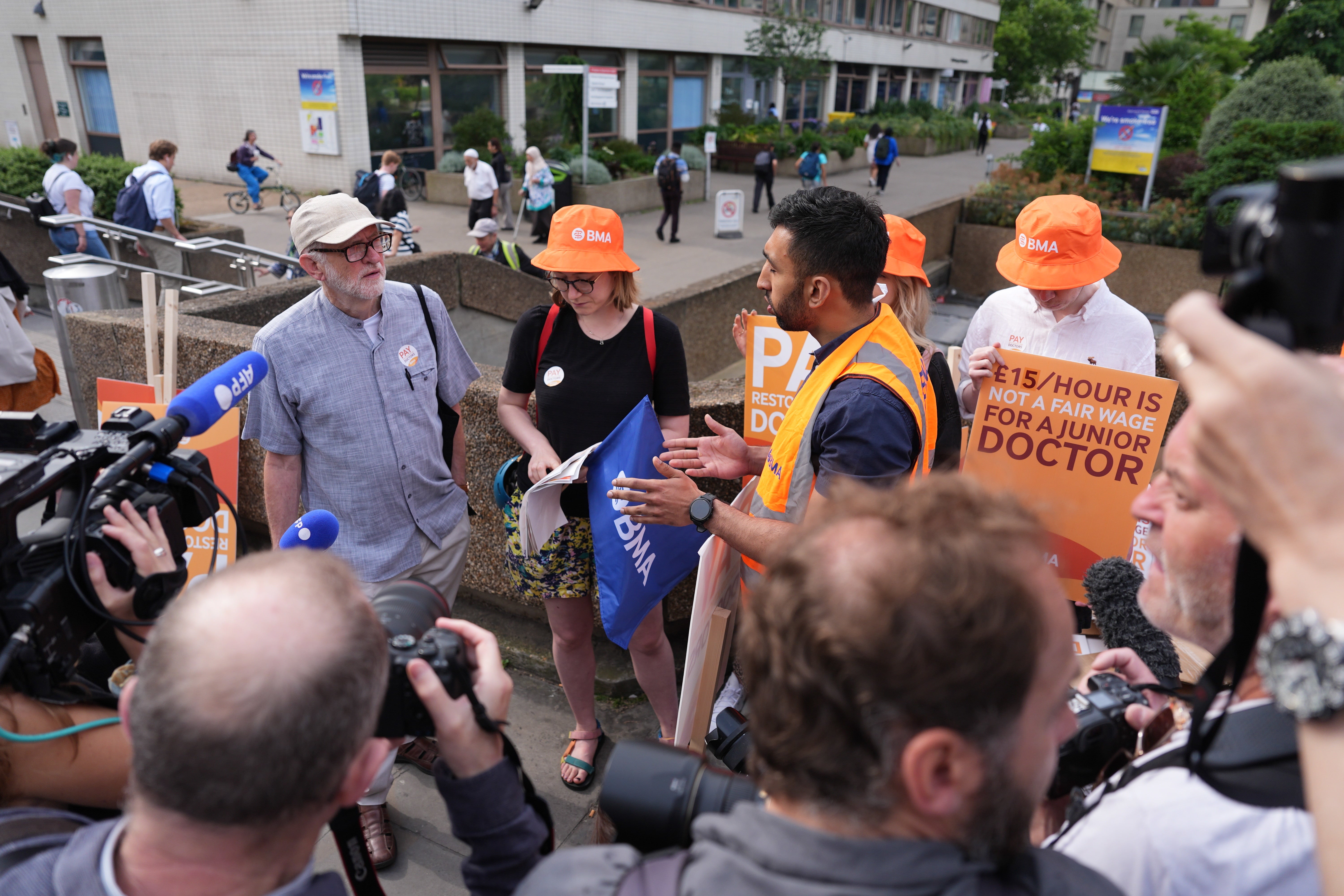 Jeremy Corbyn, left, joined the picket line at St Thomas’ Hospital in London (Jordan Pettitt/PA)