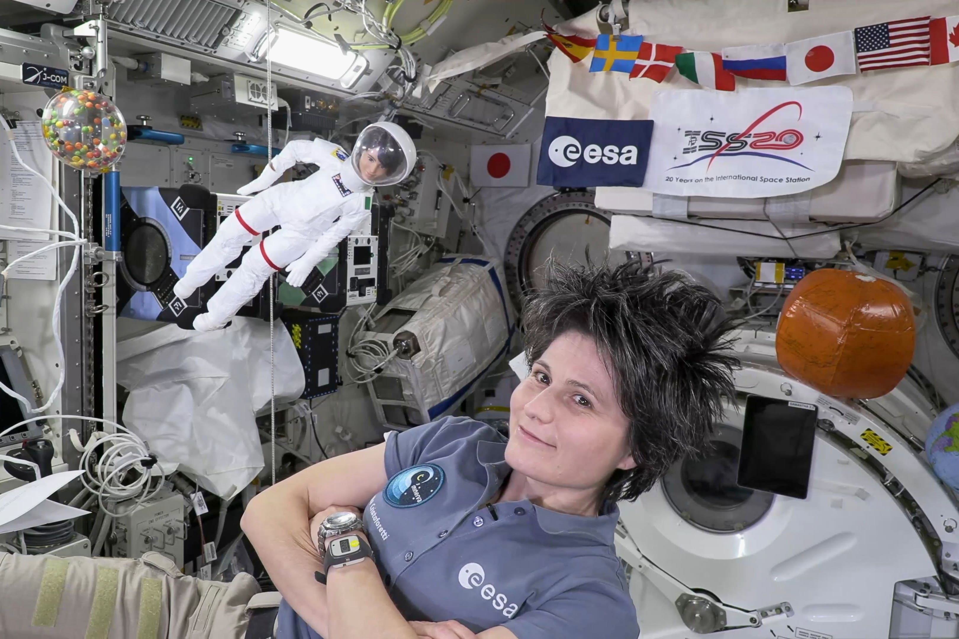 ESA astronaut Samantha Cristoforetti, with her lookalike Barbie doll on the ISS (ESA)