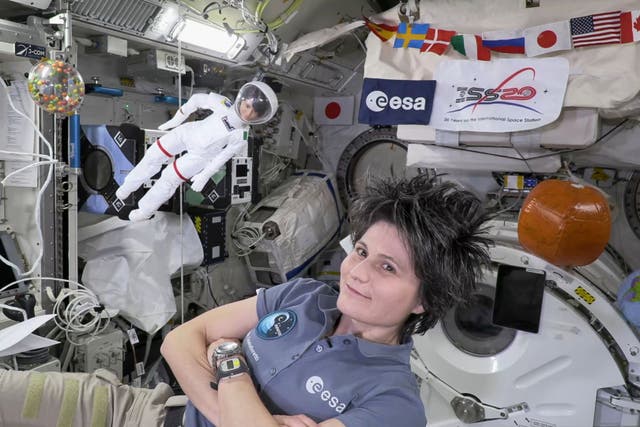 <p>ESA astronaut Samantha Cristoforetti, with her lookalike Barbie doll on the ISS (ESA)</p>