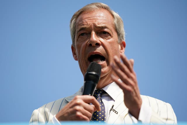 Reform UK leader Nigel Farage speaking on top of a double decker bus at the Mercure Maidstone Great Danes Hotel in Maidstone Kent (Jordan Pettitt/PA)