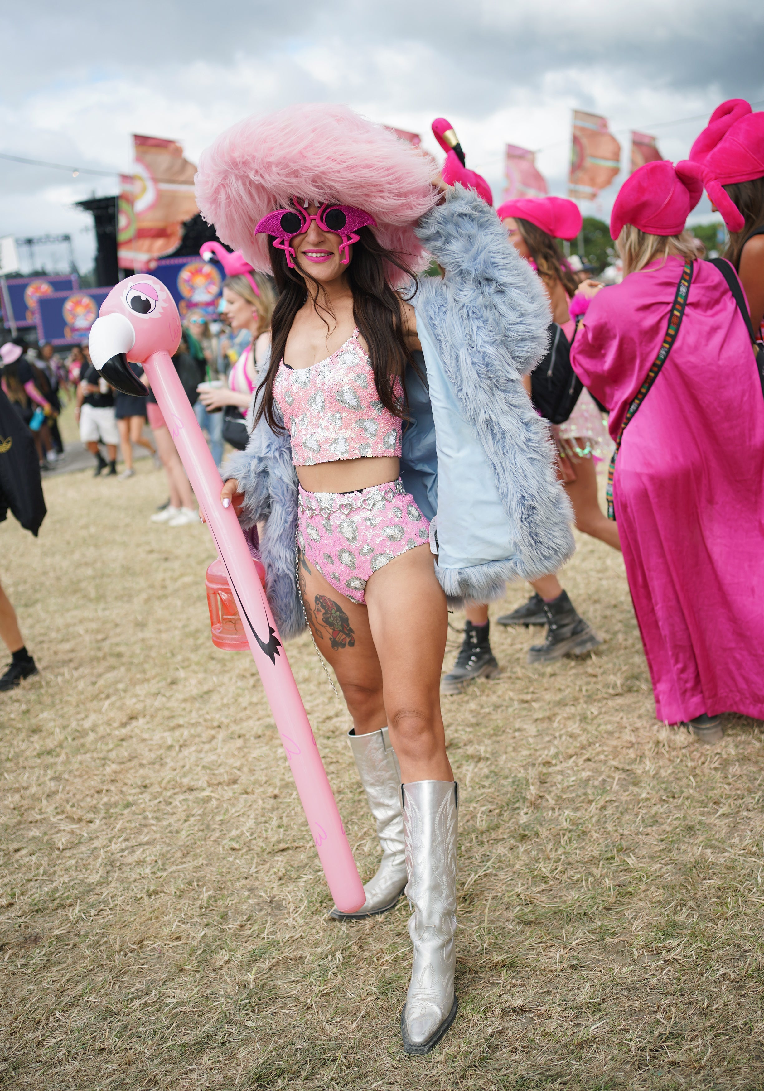 Festivalgoer Saira Biruta dressed in a flamingo costume at the Glastonbury Festival (Yui Mok/PA)