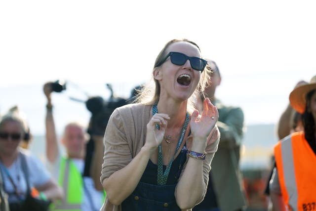 Emily Eavis opens the gates on the first day of the Glastonbury Festival (Yui Mok/PA)