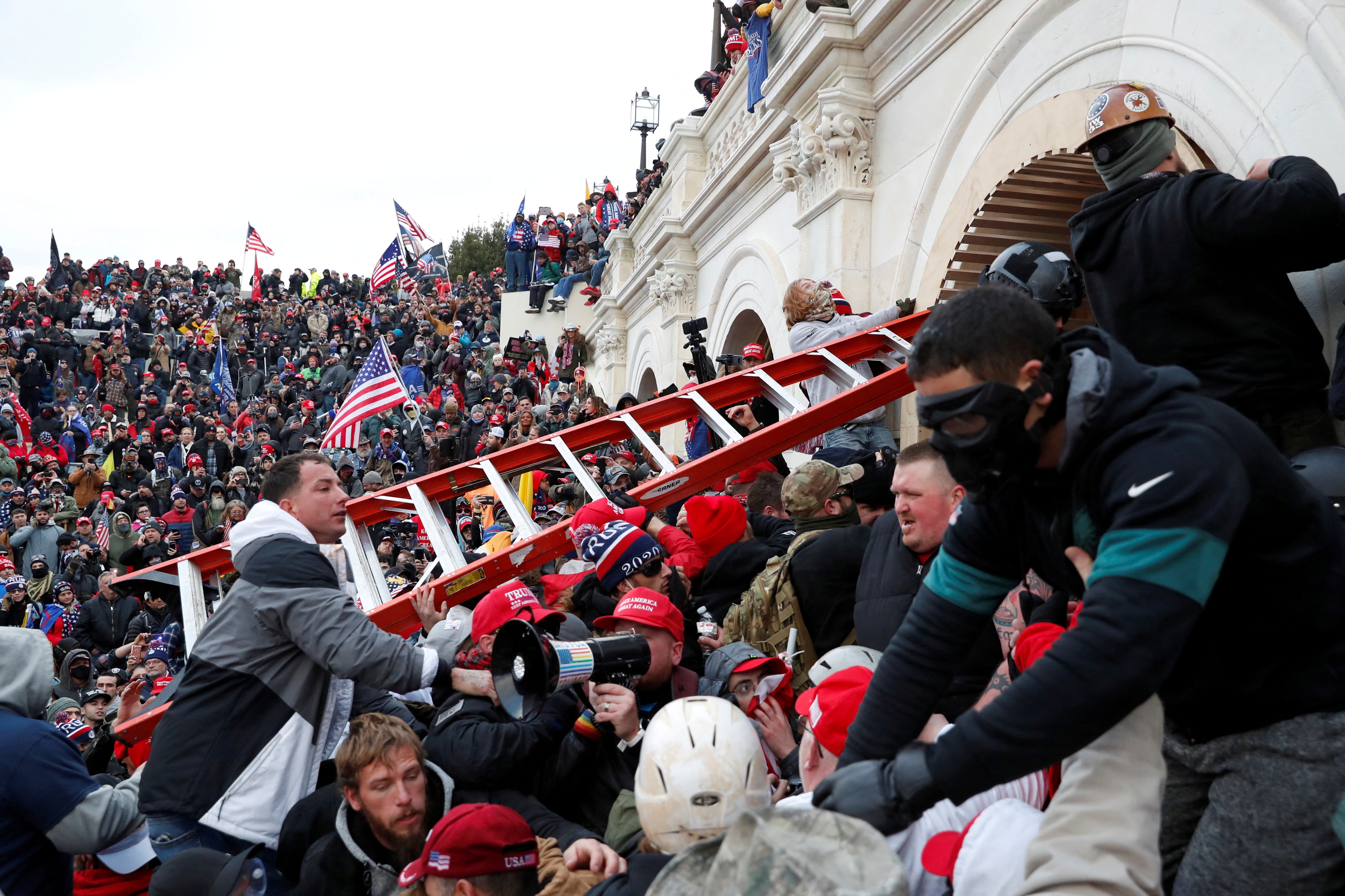 A mob of Donald Trump’s supporters broke through barricades and into the US Capitol on January 6, 2021.