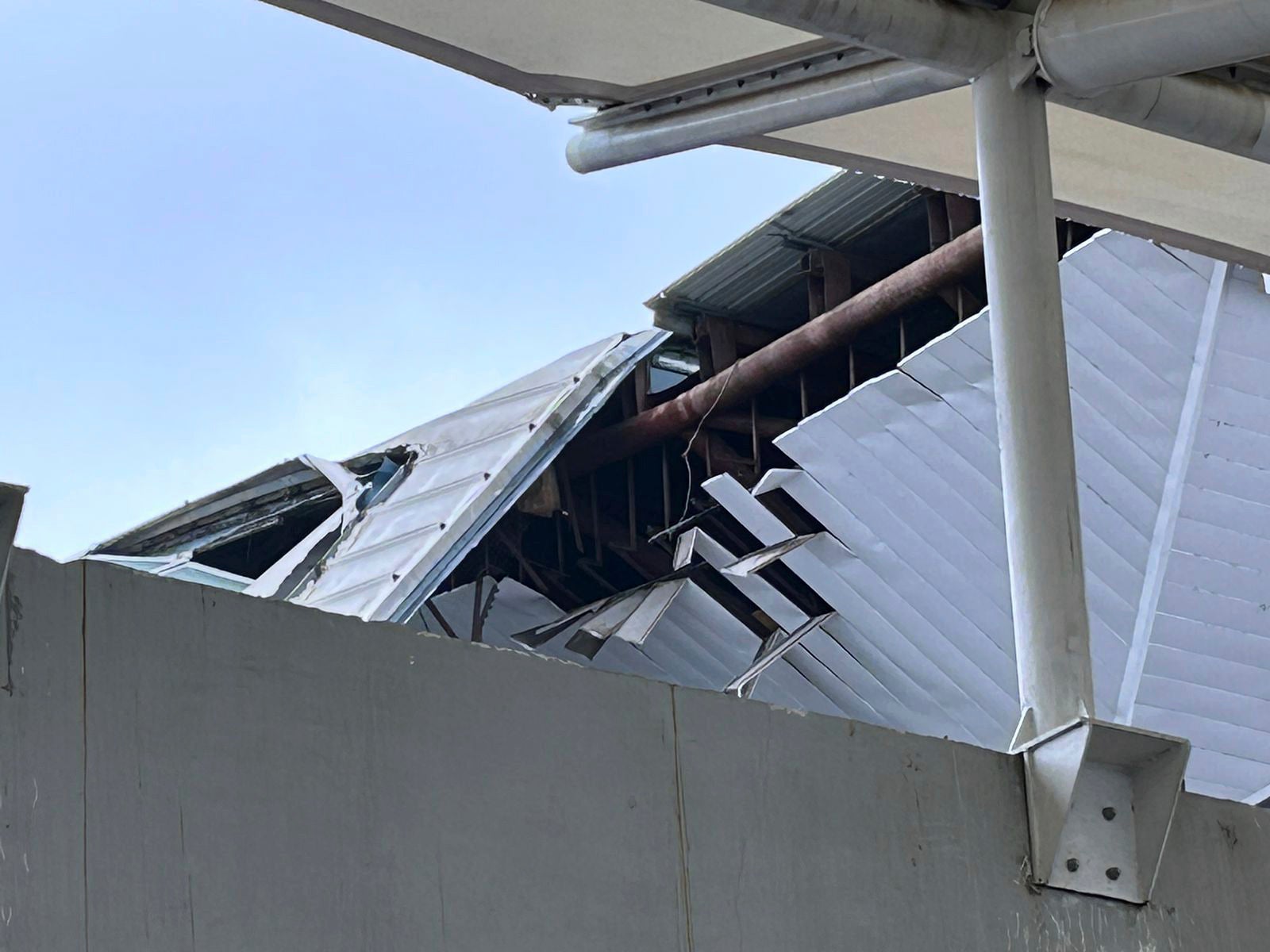 A view the damage to a part of a departure terminal canopy at New Delhi’s Indira Gandhi International Airport that collapsed in heavy pre-monsoon rains in New Delhi, India, Friday, 28 June 2024