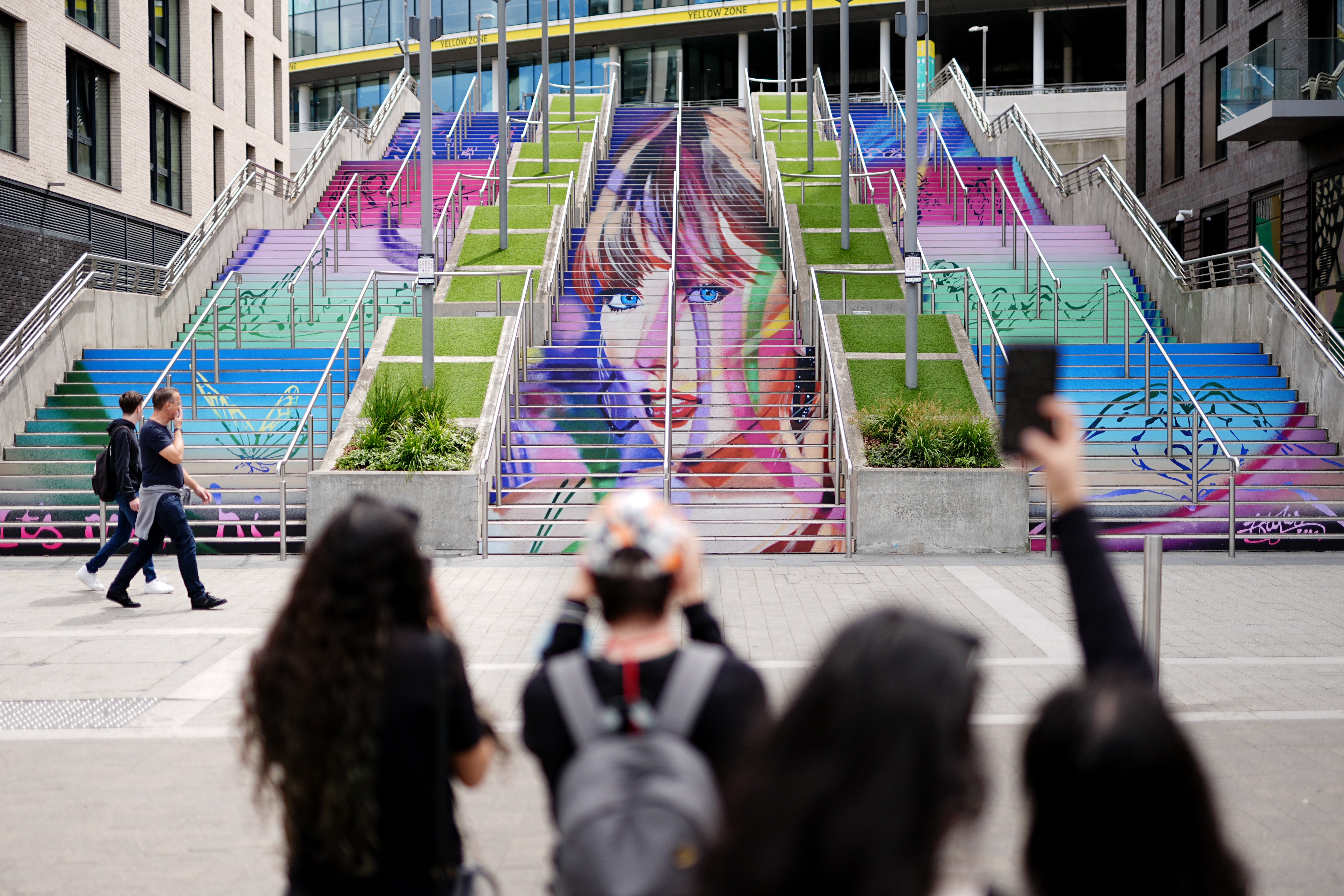 A mural of Taylor Swift outside Wembley Stadium in London in June. The ‘Swift lift’ is expected to have brought a boost to spending (Aaron Chown/PA)