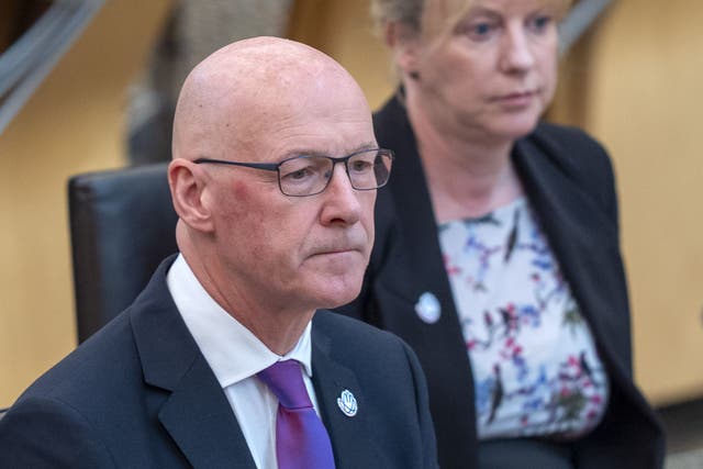 John Swinney said it is ‘unacceptable’ that delays to postal votes may leave some Scots ‘disenfranchised’ in next week’s General Election (Jane Barlow/PA)