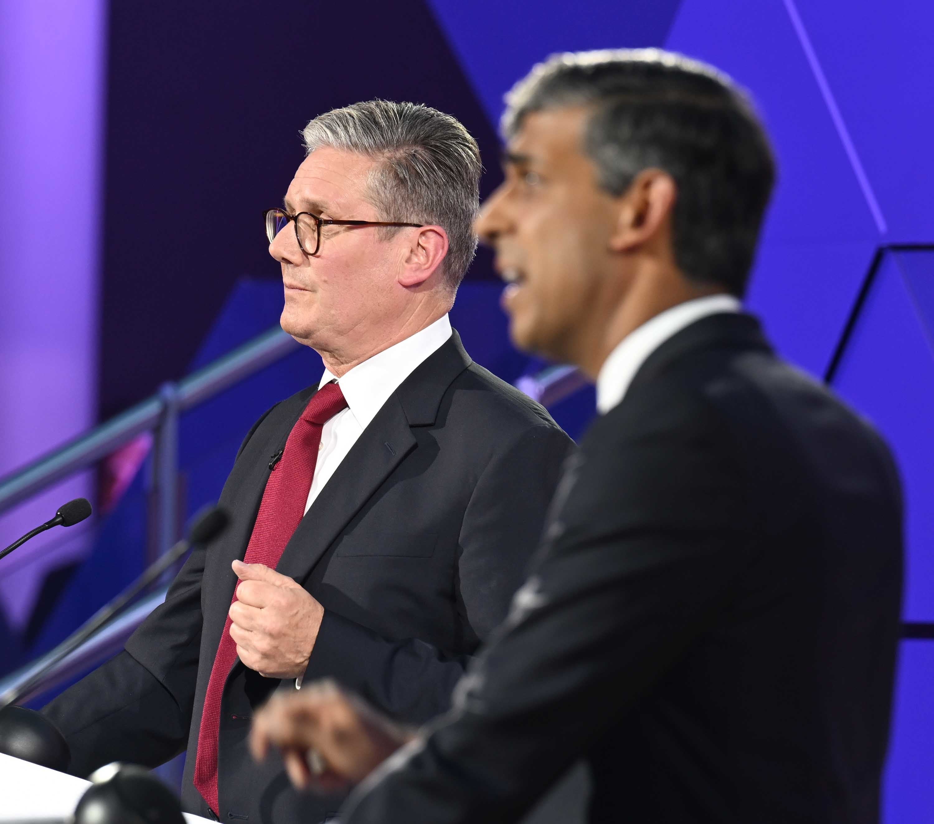 Sir Keir Starmer, left, has criticised ‘unfunded’ pledges made by Prime Minister Rishi Sunak (Jeff Overs/BBC/PA)