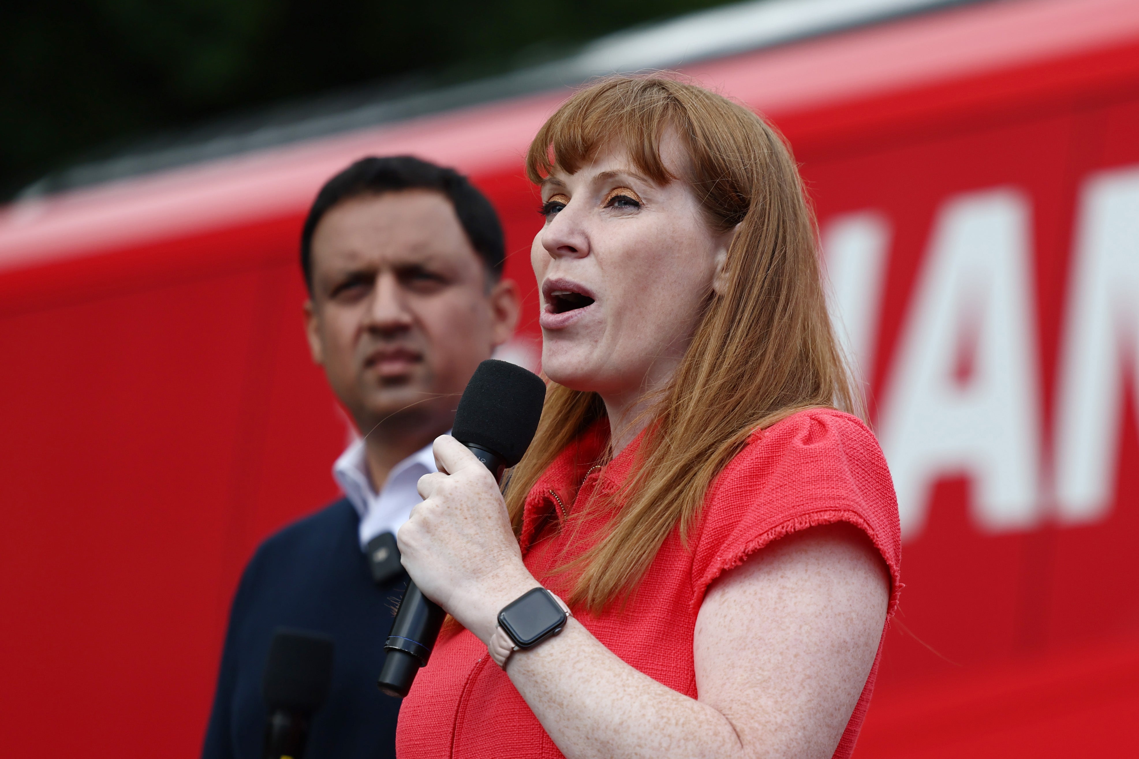 Scottish Labour leader Anas Sarwar and Labour Party deputy leader Angela Rayner speak at a campaign event in Hamilton, Scotland