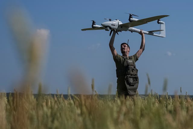 <p>A Ukrainian serviceman launches a mid-range reconnaissance type drone, Vector, for flying over positions of Russian troops in a Kharkiv region</p>