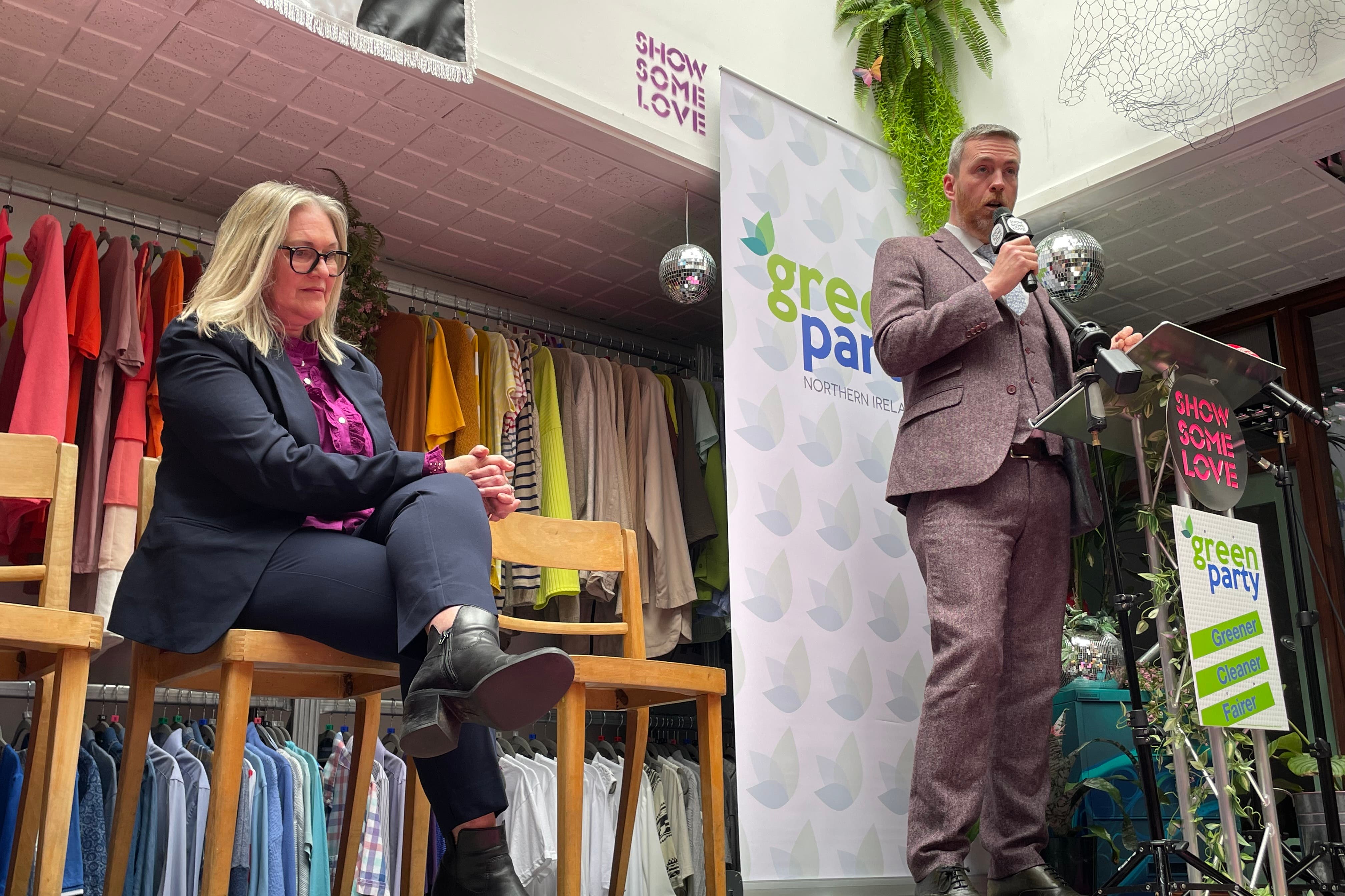 Green Party Northern Ireland leader Mal O’Hara (right) and deputy leader Lesley Veronica (seated left) at the launch of the party’s General Election manifesto at the Show Some Love Green House centre in Belfast on Friday (Rebecca Black/PA)