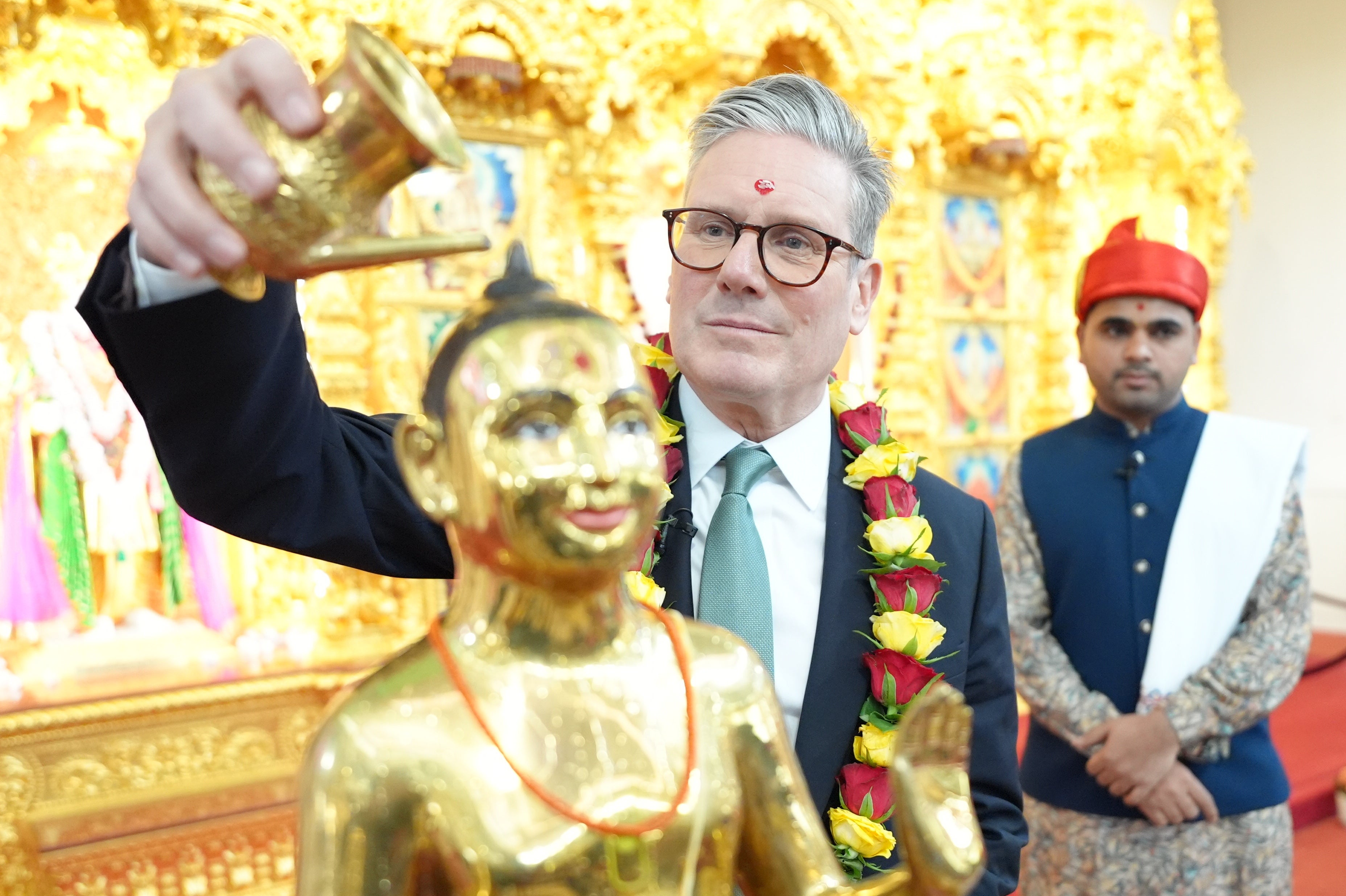 Labour Party leader Sir Keir Starmer during a visit to a Hindu temple in London, while on the General Election campaign trail (Stefan Rousseau/PA)